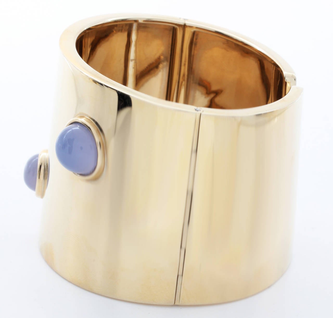Fred Paris Cuff Bracelet in 18K Yellow Gold, with four bezel mounted Chalcedony cabochons. Measures almost 2.00 inches at widest point, Hallmark 