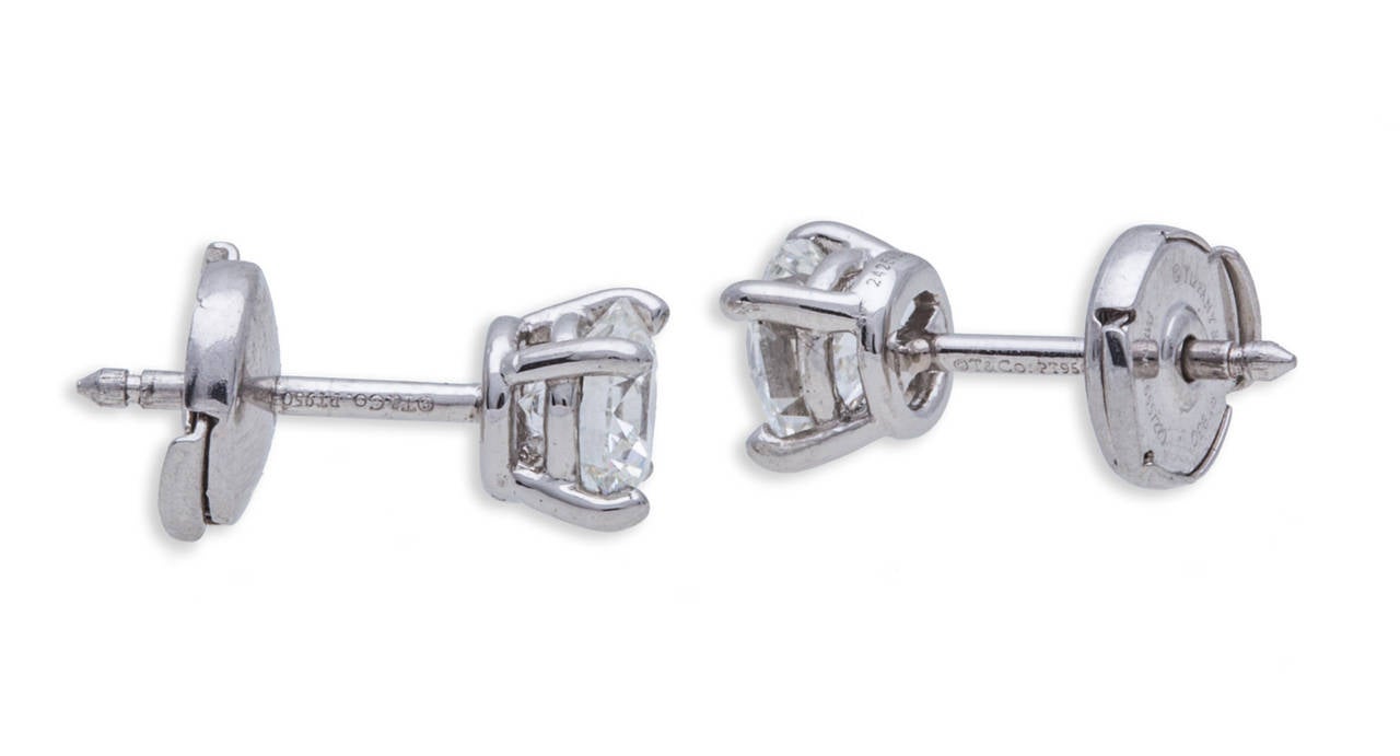 Tiffany & Co. Diamond Stud Earrings in Platinum, with Round Diamonds (0.75ct H/ VS1  &  0.74ct H/ VS2), Total Diamond Weight 1.49ct, Hallmark 