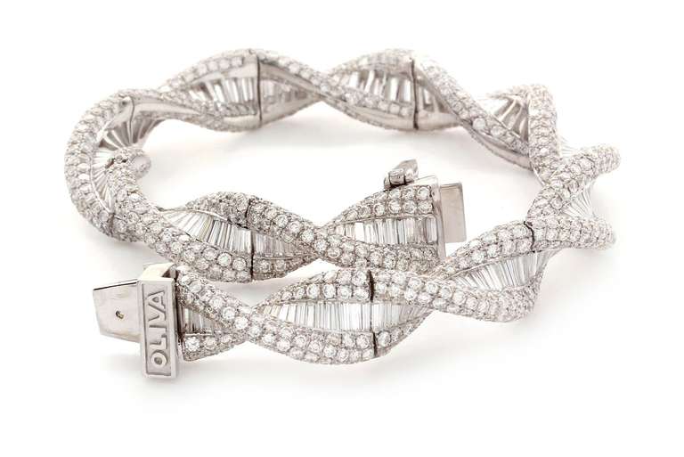 Oliva Twisted diamond pave bracelet with diamond center baguettes in 18K White Gold. Total Diamond Weight 22.00ct.