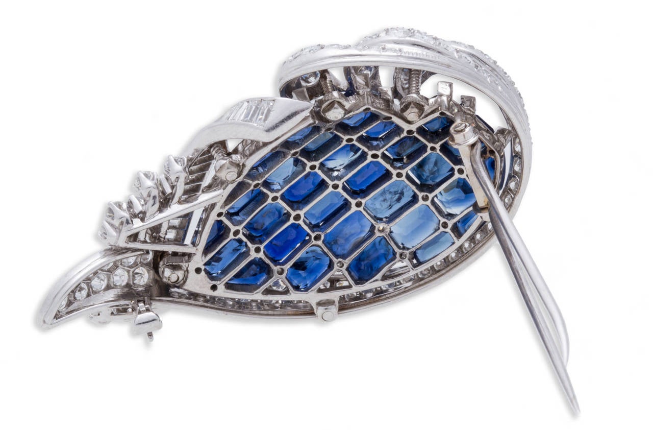 Diamond and Blue Sapphire Brooch in Platinum. Brooch Dimensions: Length 2 .13