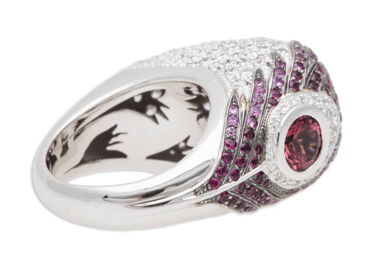 Carrera Y Carrera Diamond and Pink Tourmaline Peacock Ring in 18K White Gold. Entire ring pave, one side and top are diamond pave, the other side houses a round pink tourmaline stone surrounded by a ring of diamond pave and pink tourmaline pave to