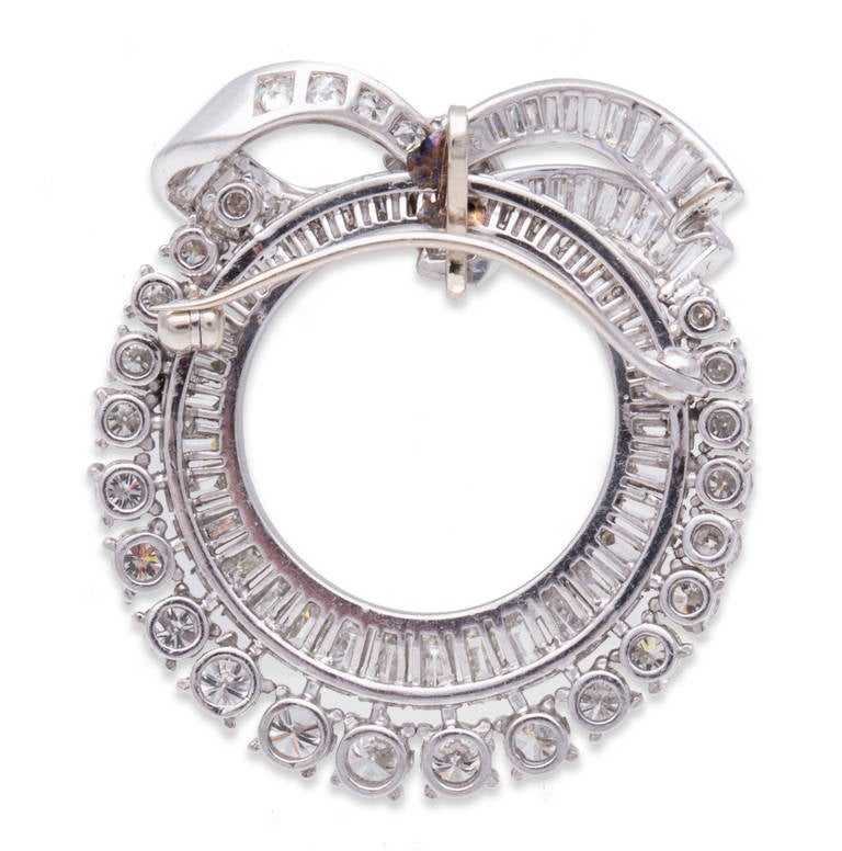 Diamond Wreath Brooch in Platinum with Baguette, Tapered Baguette, and Round Diamonds. Length 1.5