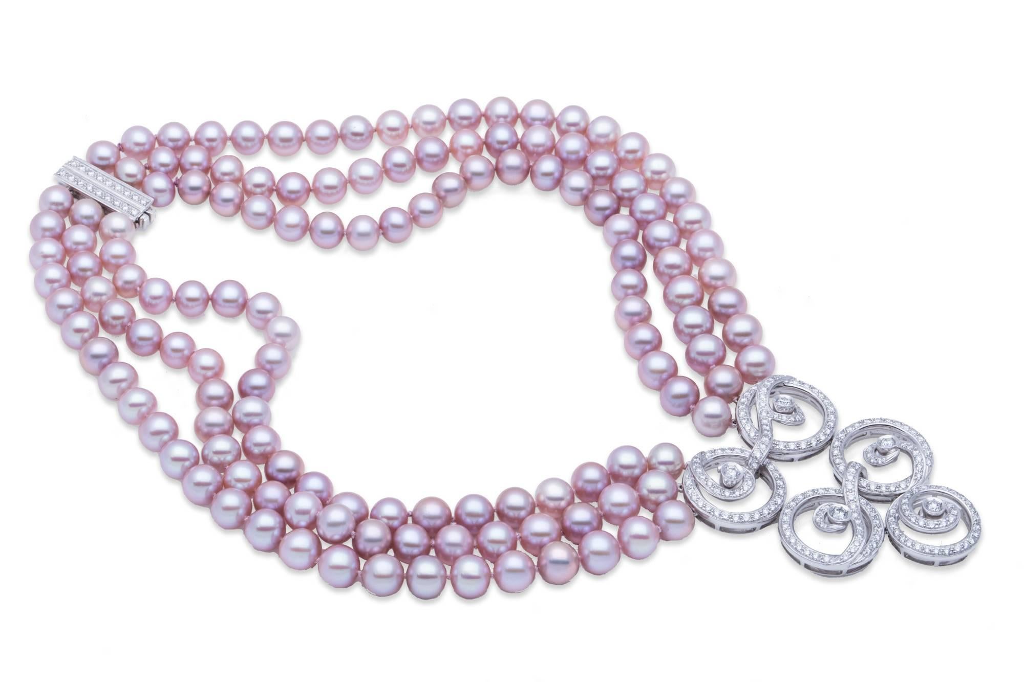 Asprey of London Pink Pearl Necklace with 18K White Gold Diamond Swirl Pendant and 18K White Gold Diamond Clasp. Three Rows (140 pcs) 8.00mm-8.50mm Pink Pearls, Total Diamond Weight: 5.00ct, Diamond Pendant Dimensions: L 2.38