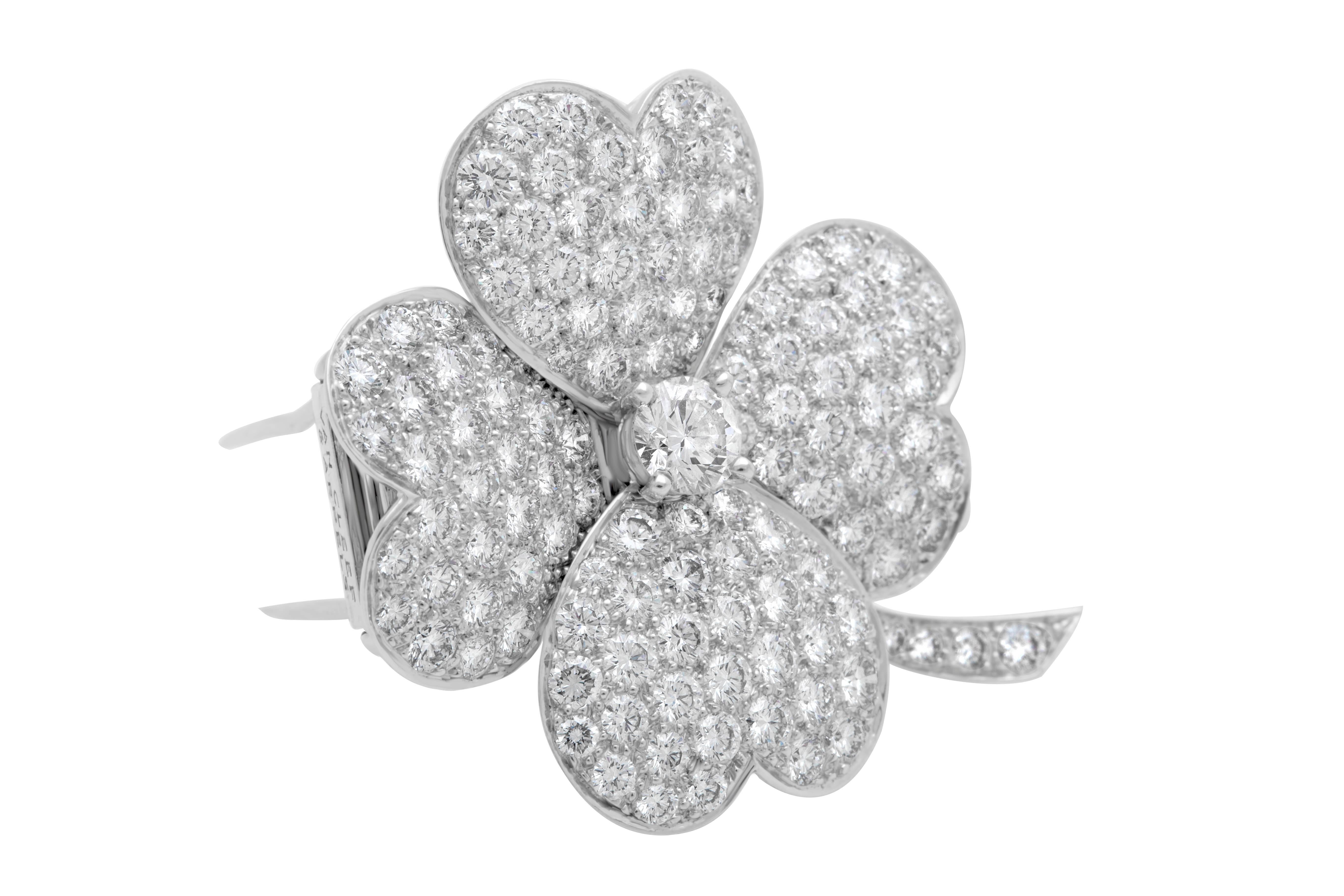 Classic Van Cleef & Arpels VCA Diamond Pave Very Large Model Cosmos Clip Pendant in 18K White Gold with approx. 0.50 carat round diamond center stone, Approx. 4.80 carat Diamond Pave Flower, Length 1.63