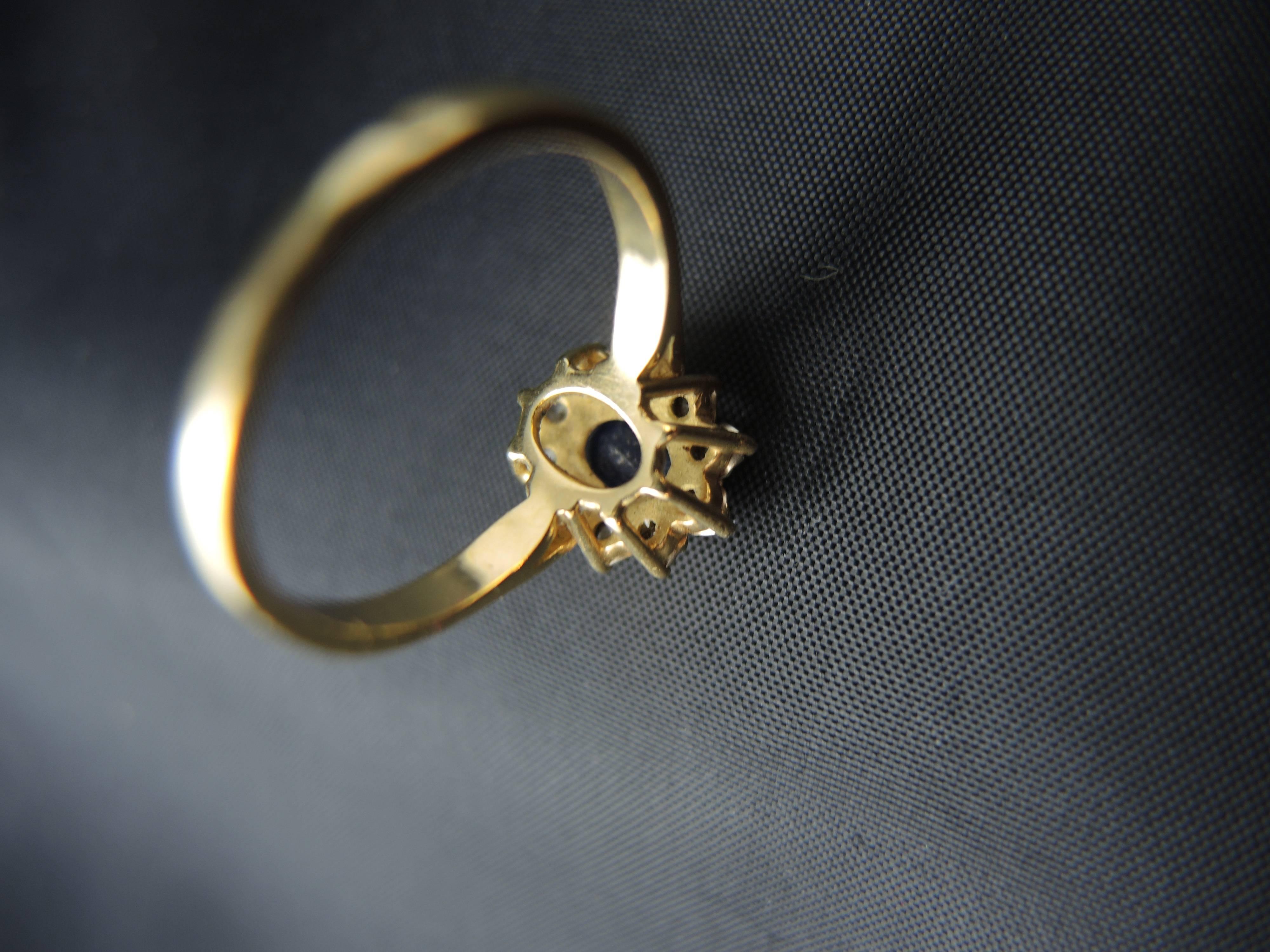 Women's French Vintage Gold Cluster Ring with a Sapphire Surrounded by Diamonds