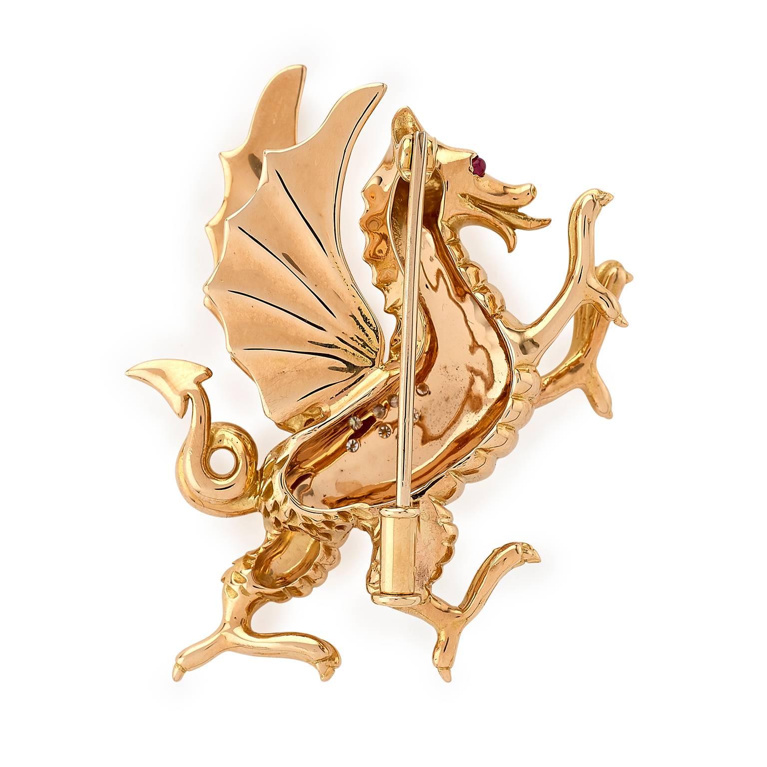 Welsh dragon brooch handmade in 18 carat rose gold with .32 carats diamonds set to its wings, cabochon cut ruby eyes. With easy to use yet secure tube catch brooch fitting. Handmade in E Wolfe and Company’s London Workshop
