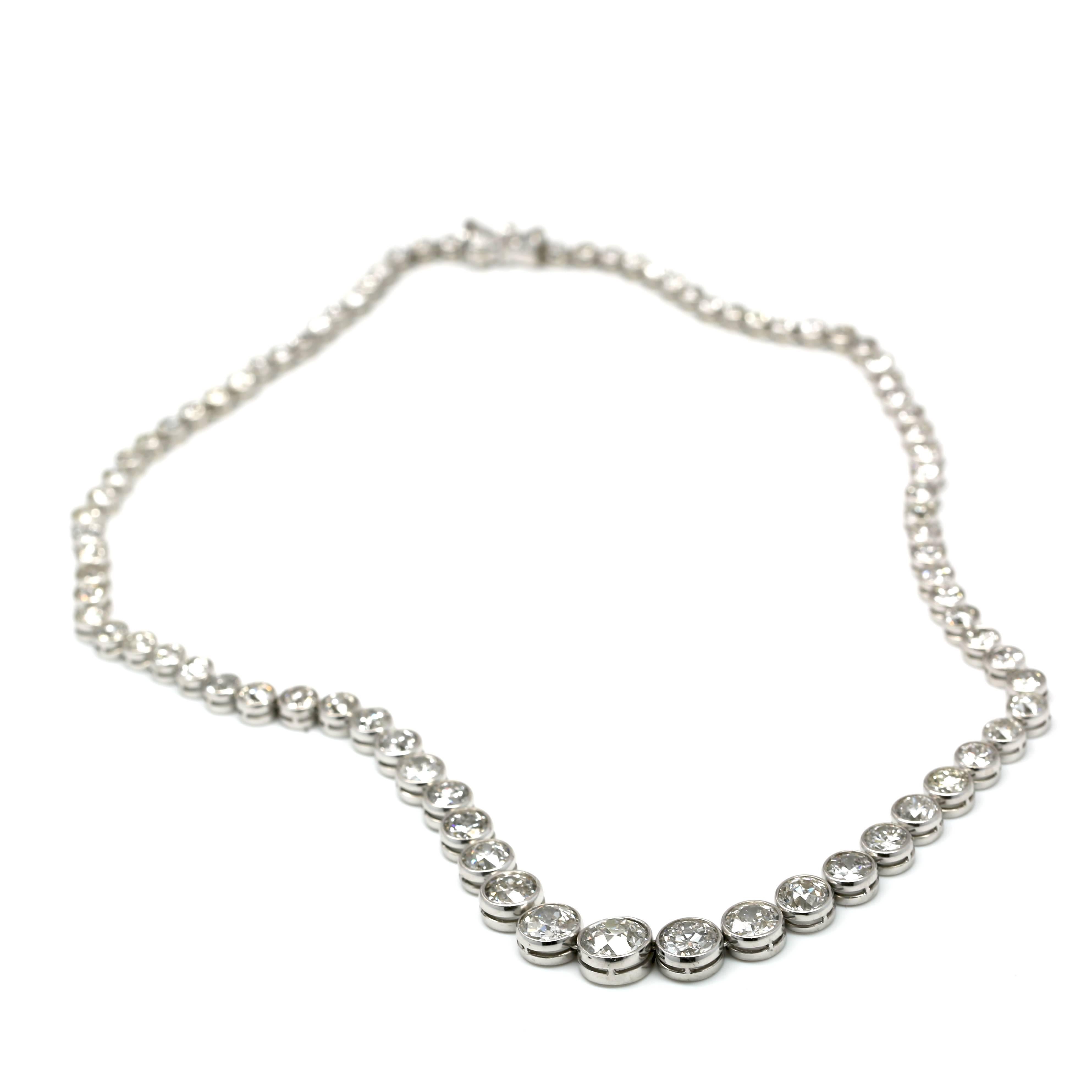 Platinum Riviera Necklace set with 90 European Cut Diamonds equaling Approx. 41.00 Carats F-H Color VS1-SI1 Clarity.