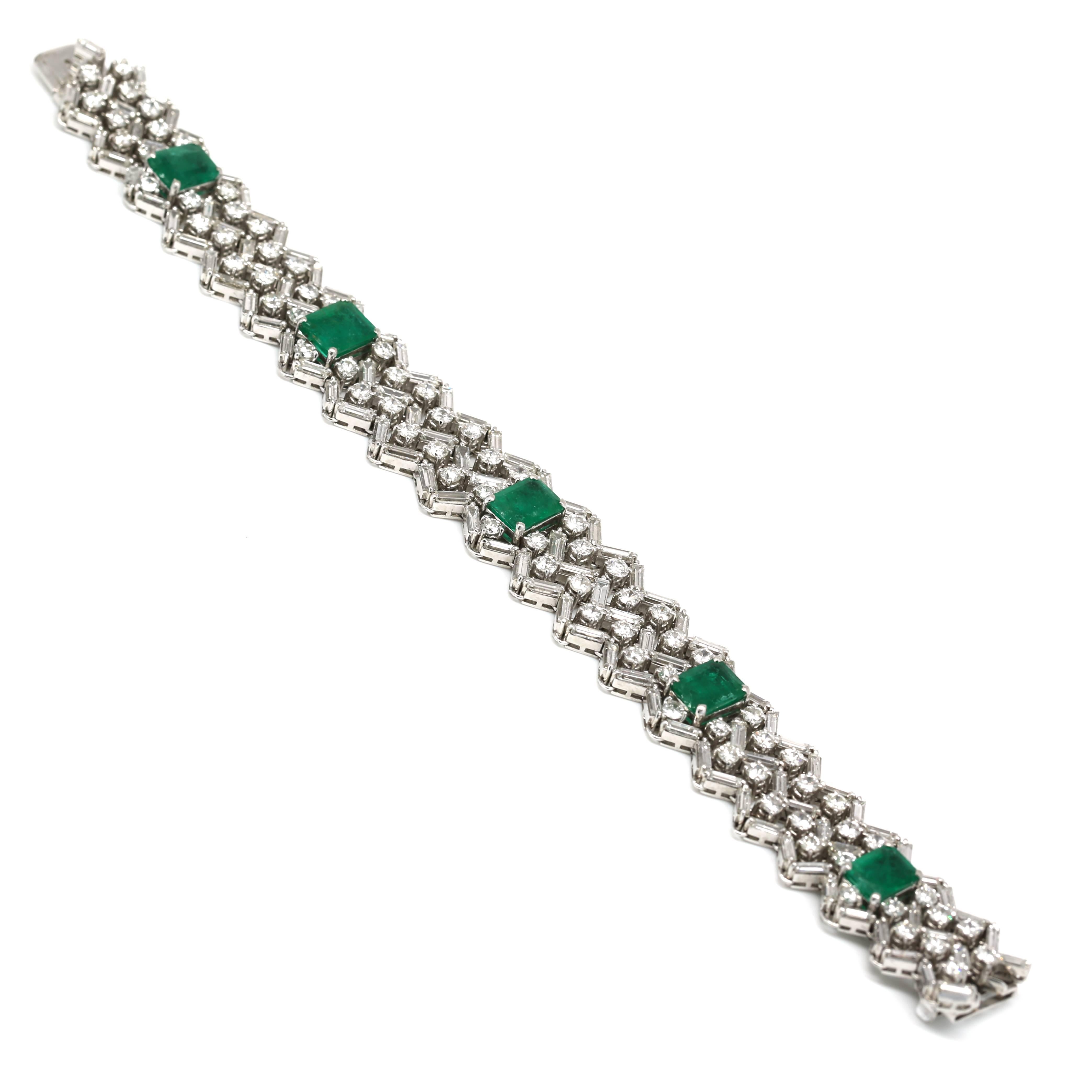 Spectacular Platinum Bracelet set with 16.00 carats of the Finest Quality Diamonds D-E Color VVS-VS Clarity. Featuring 5 Colombian Emeralds Weighing Approx. 10.00 Carats