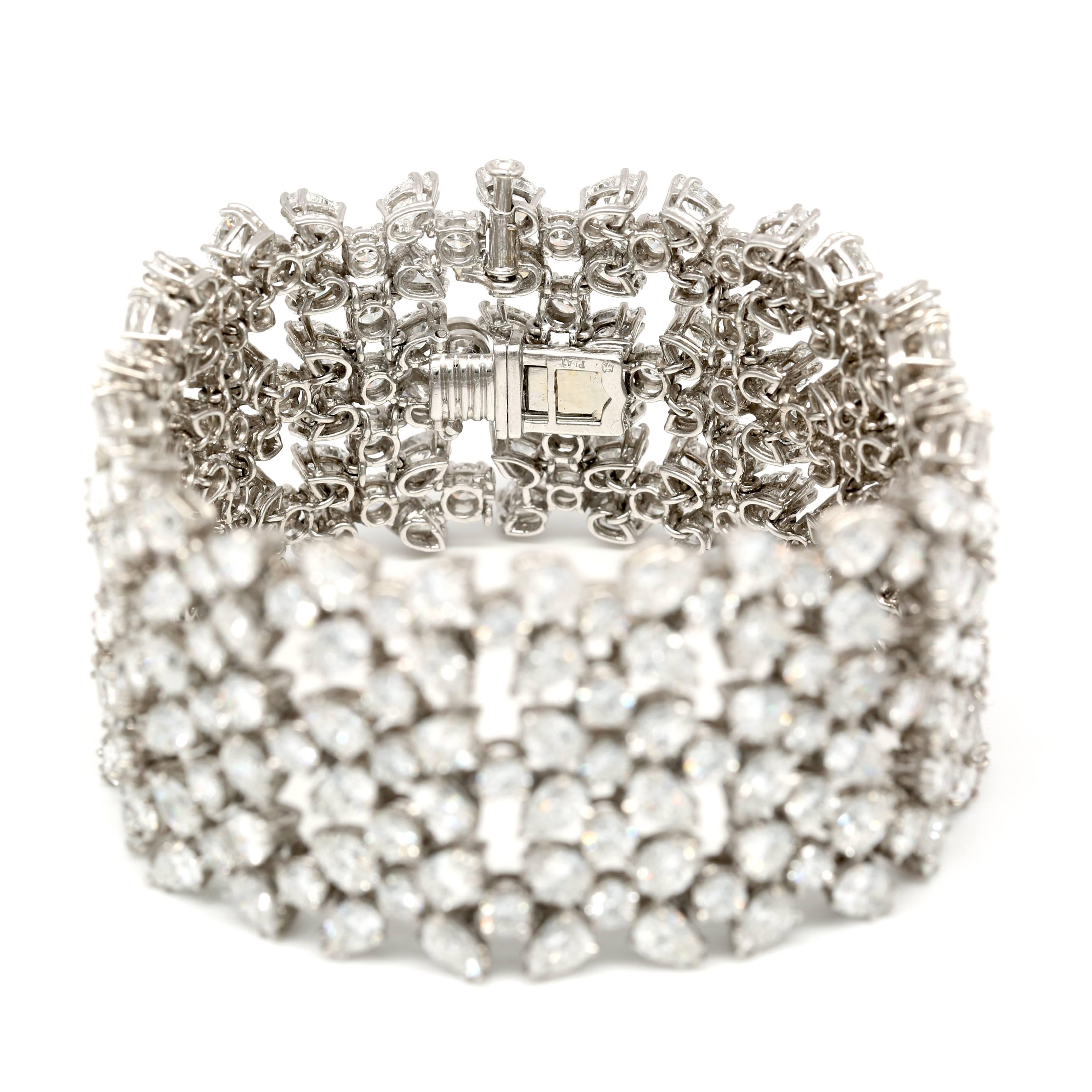 1960s Platinum Diamond Bracelet made by Carvin of Paris, set with 55.00 Carats of Collection Quality Diamonds D-F Color VVS-VS Clarity.