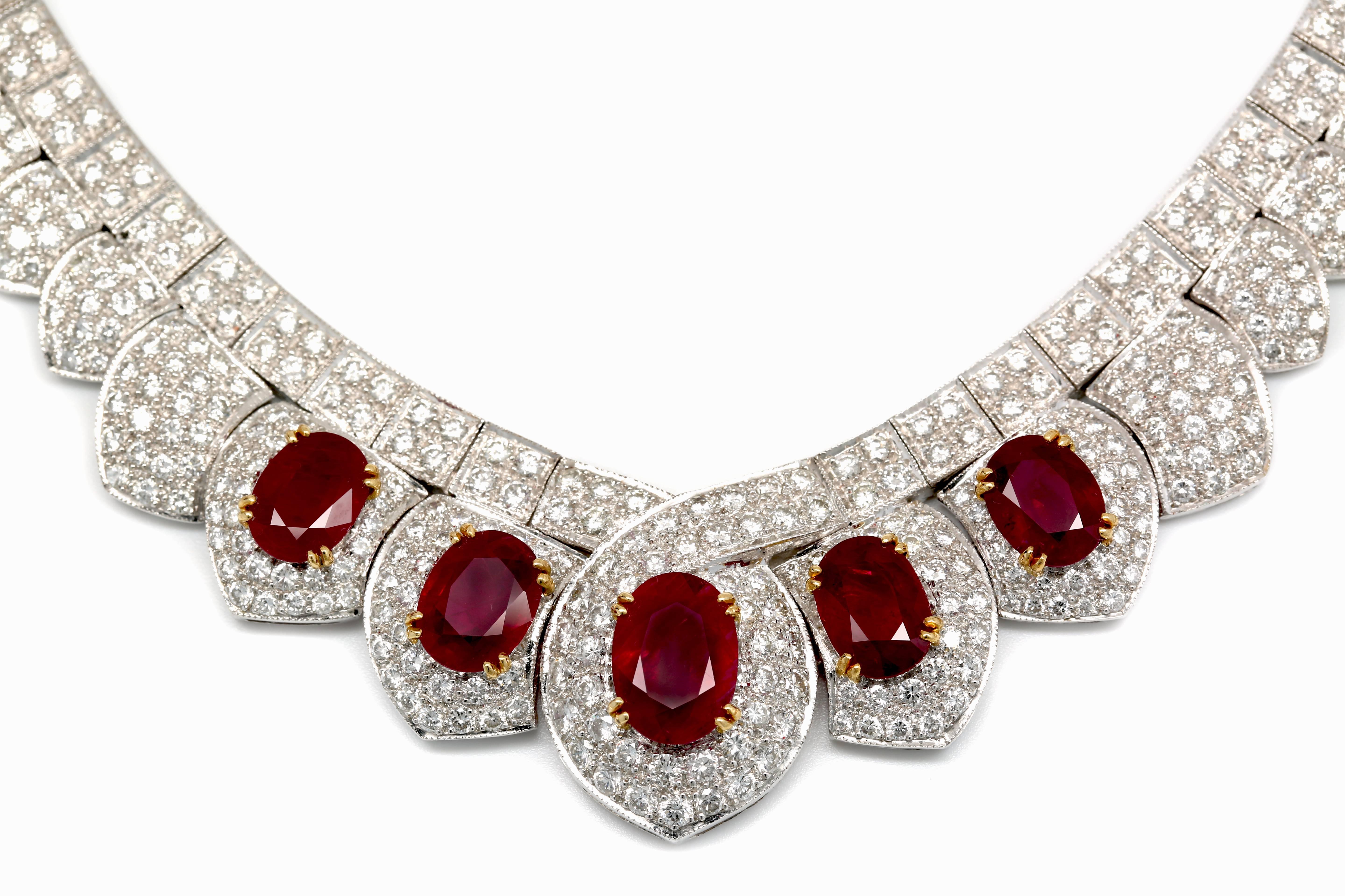 1980s Ruby and Diamond Necklace set with 25.00 Carats of Collection Quality Diamonds D-E Color VVS-VS Clarity. Featuring 5 Rubies weighing Approx. 17.00 Carats set in 18K White Gold.