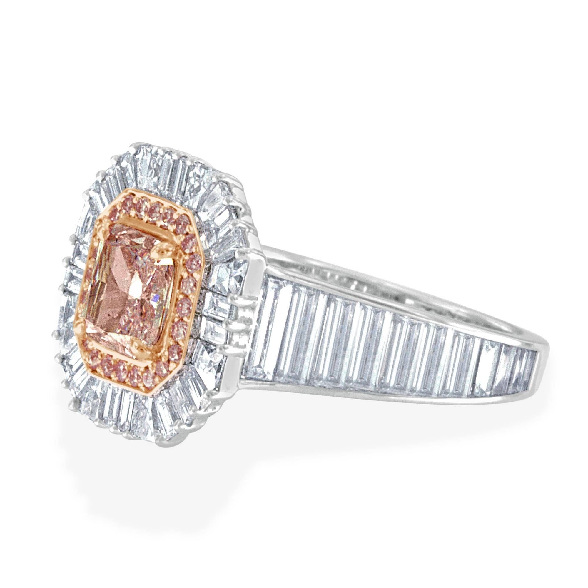 This magnificent pink diamond ring created by renowned designer Bez Ambar, features an extremely rare GIA certified 1.04 carat cushion cut intense fancy purplish-pink diamond set in a phenomenal one of a kind Bez Ambar designer platinum setting