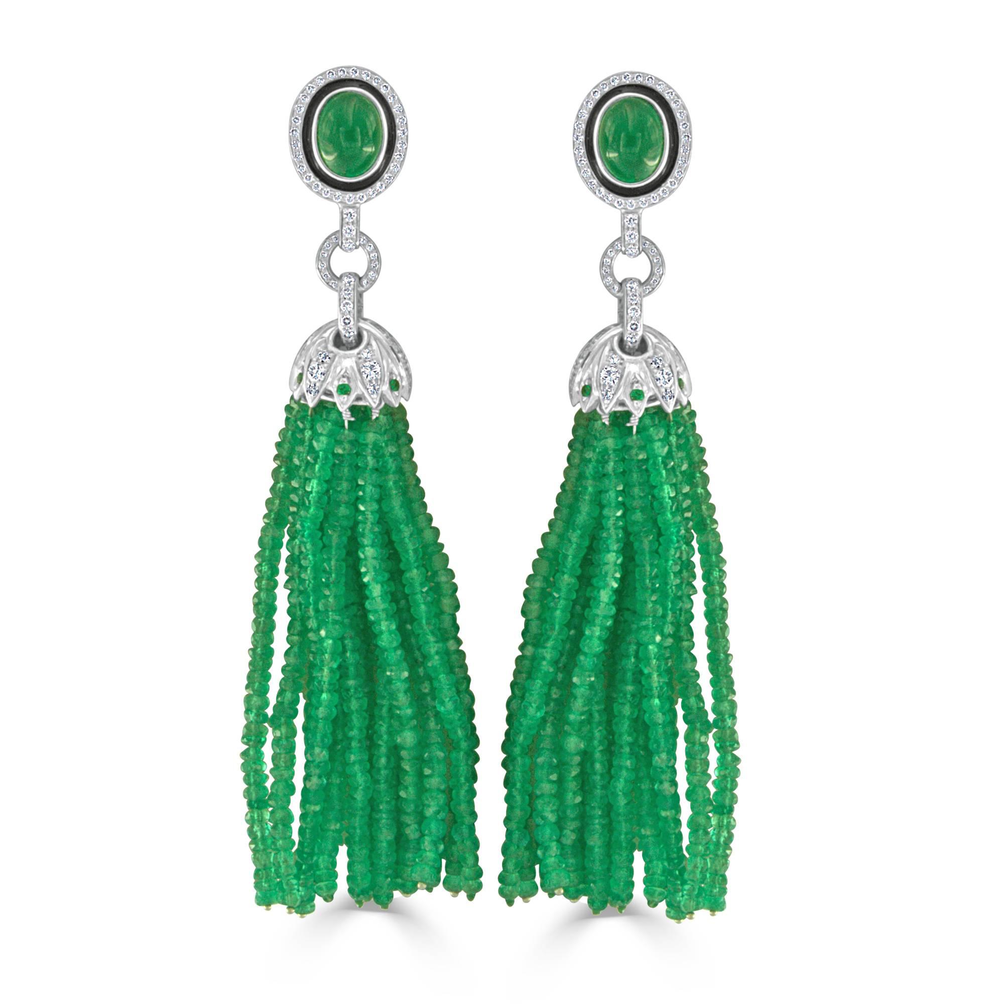 These divine emerald and diamond tassel earrings feature 497- emeralds weighing 64.38 carats total, and 76- round brilliant cut diamonds weighing 1.10 carats total. Each earring has 15 strands of faceted emerald beads that lend just the right amount