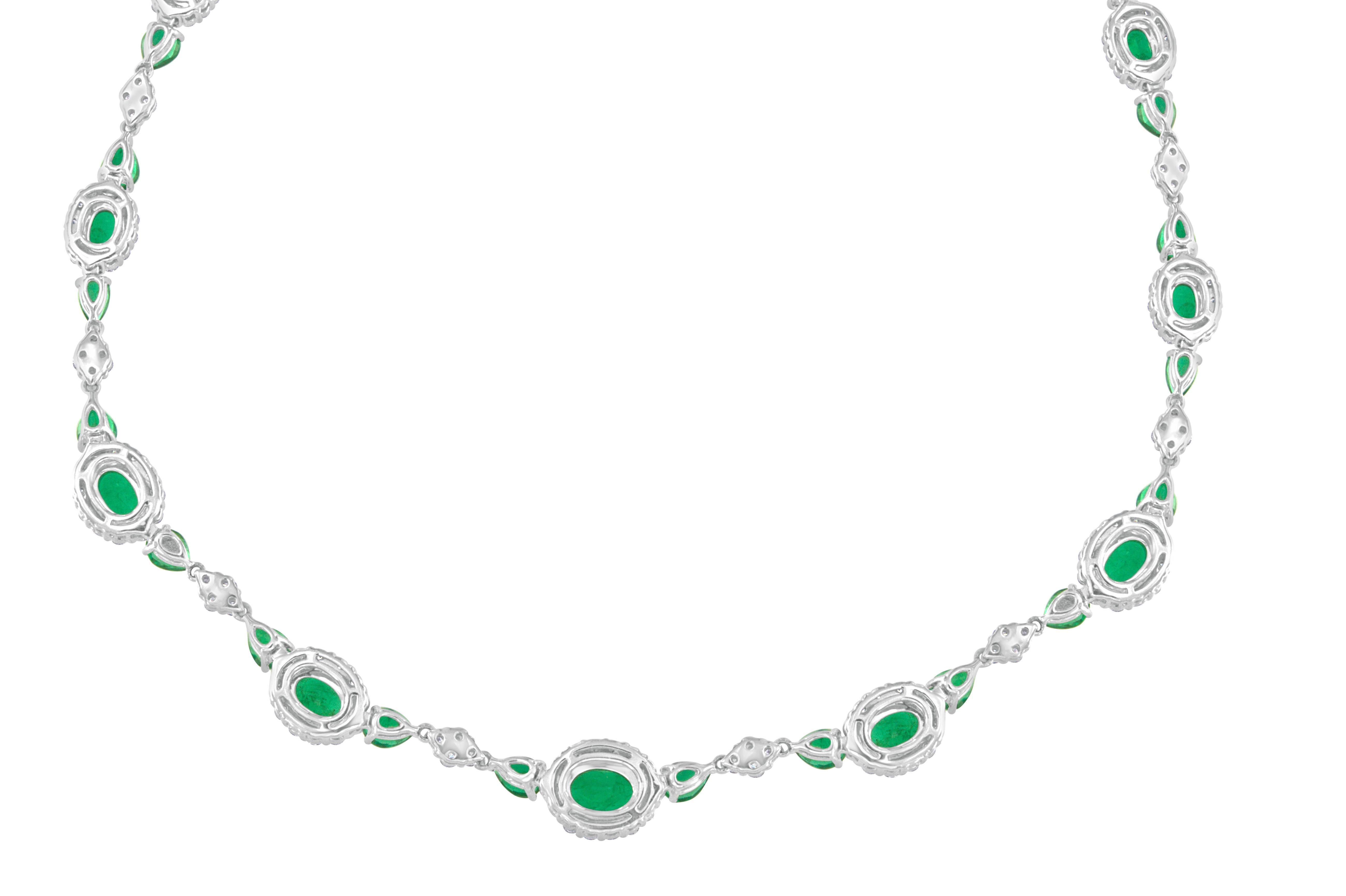 The extraordinary emerald and diamond 18 karat white gold necklace features 49- oval and pear shape emeralds weighing 14.85 carats total, having very fine color and cut. Set with 258- round brilliant cut diamonds weighing 5.00 carats totals, having