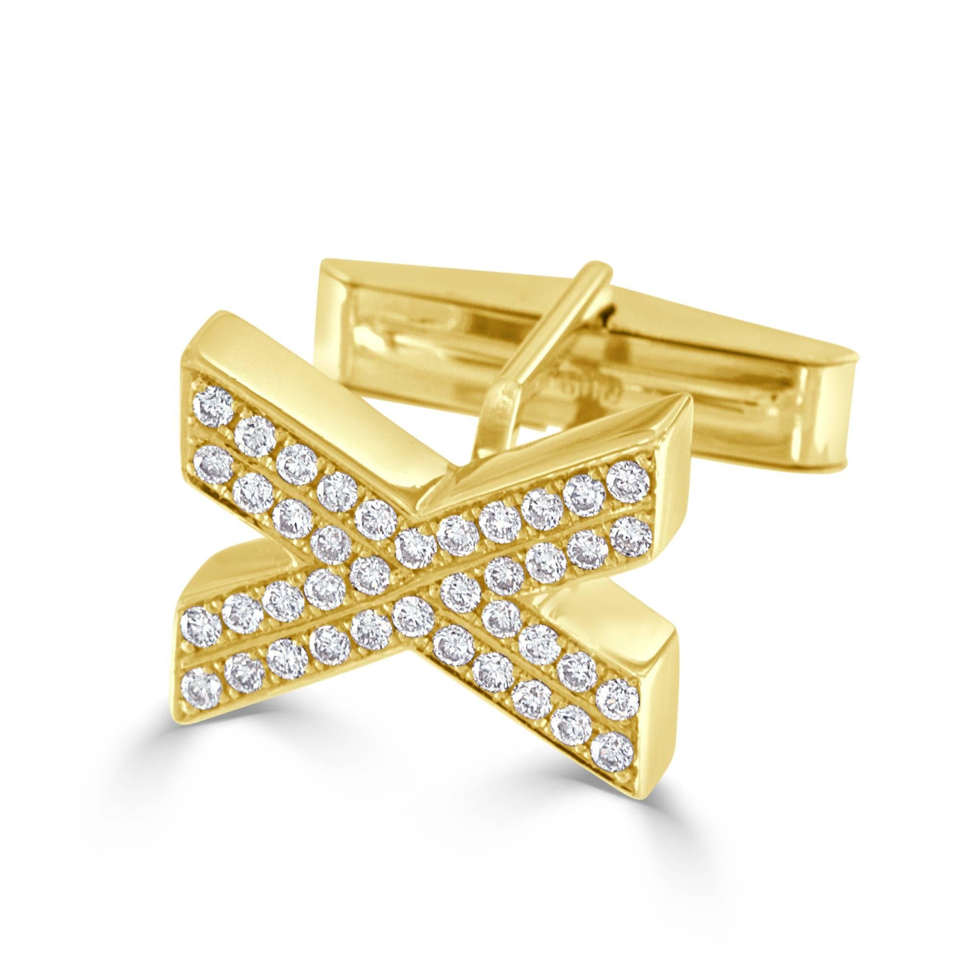 These gent's diamond cuff links featuring an X motif have 80- round brilliant cut diamonds weighing 1.07 carats total, having fine makes. Measuring 0.75 inch in length and 0.50 inch in width.  These handsome cuff links are 14 karat yellow gold,