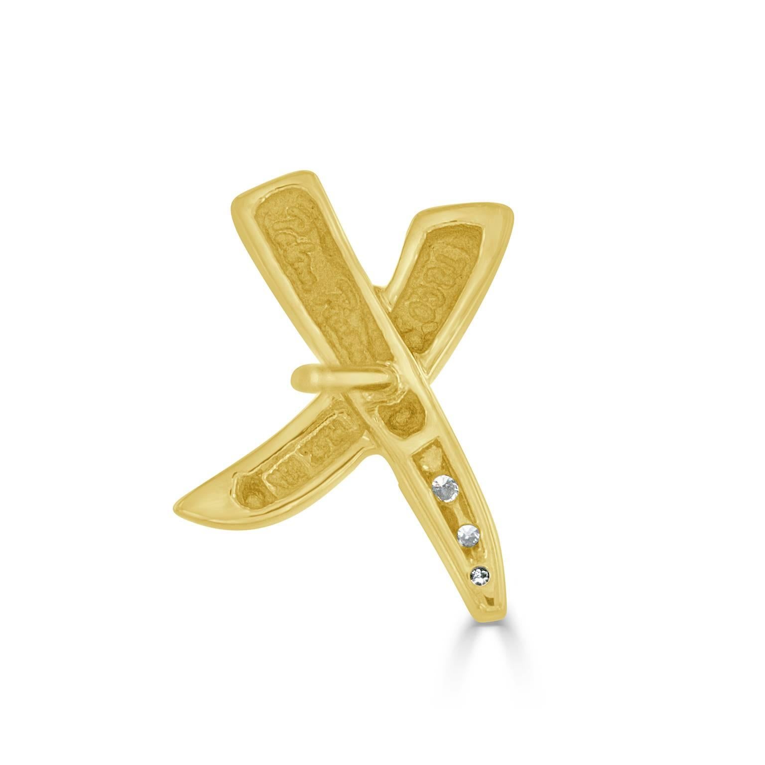 These Tiffany & Co. Paloma Picasso diamond X earrings feature 7- round brilliant cut diamonds weighing approximately 0.11 carats total, having VS clarity and G color. These charming 18 karat yellow gold earrings measure approximately 0.50 inch by