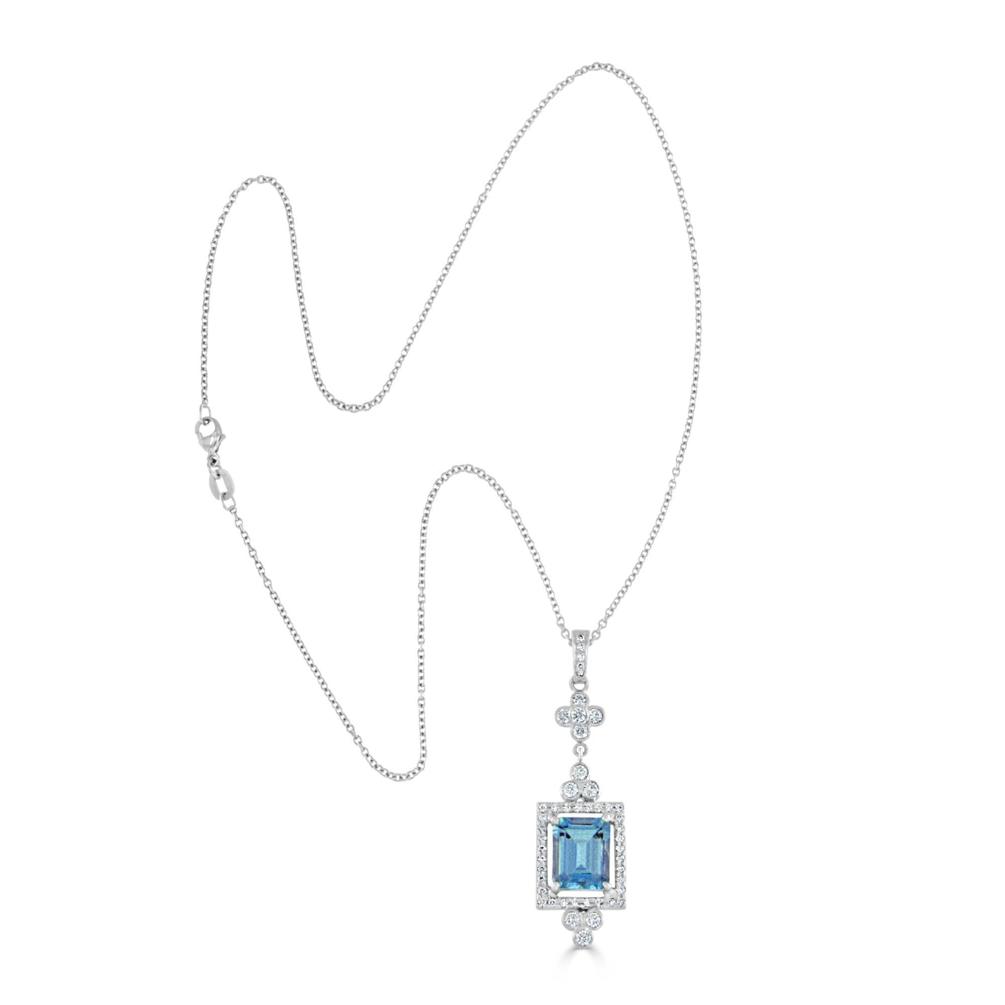This beautiful aquamarine and diamond platinum pendant features an emerald cut aquamarine weighing 2.92 carats, having very fine cut and color. Set with 47- round brilliant cut diamonds weighing 0.94 carats total, having VS2 clarity, G color and