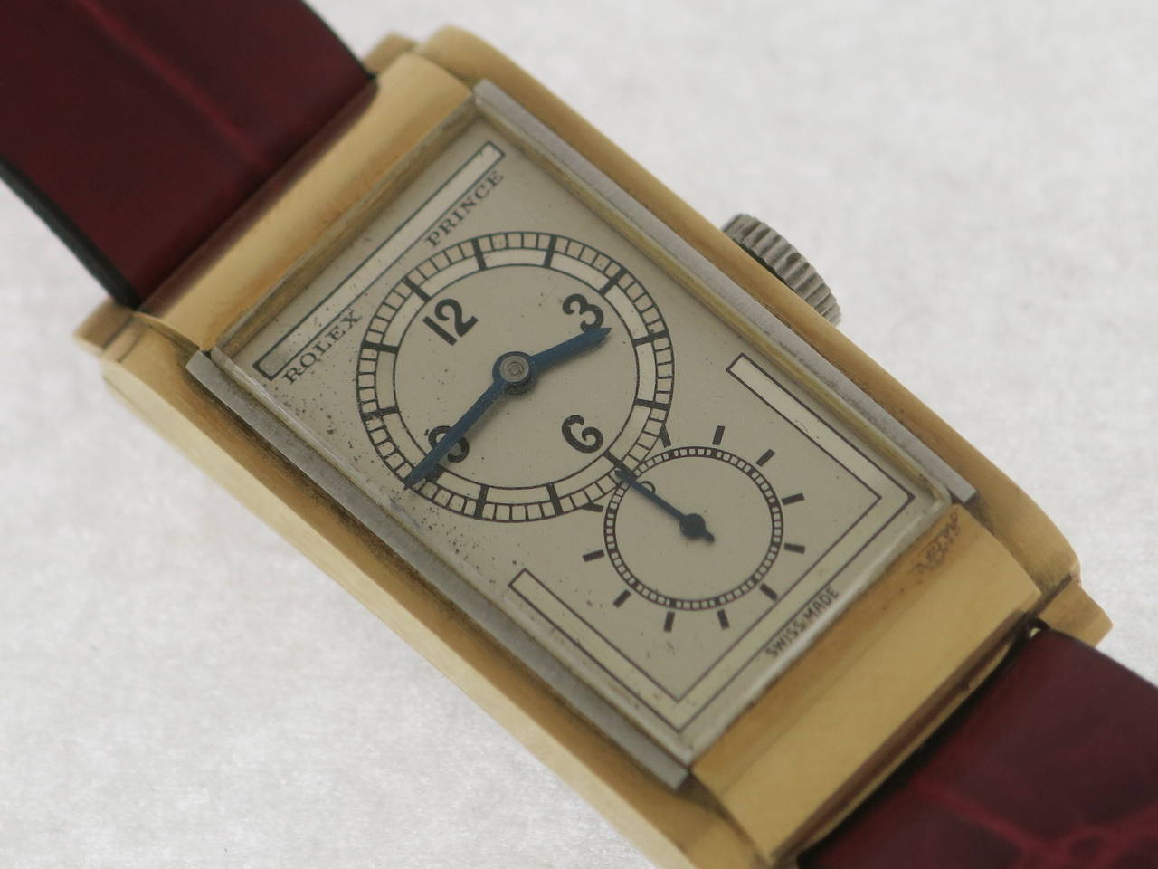 A beautiful Prince, a stainless steel and yellow gold rectangular shaped wristwatch with special two tone dial in very good condition.