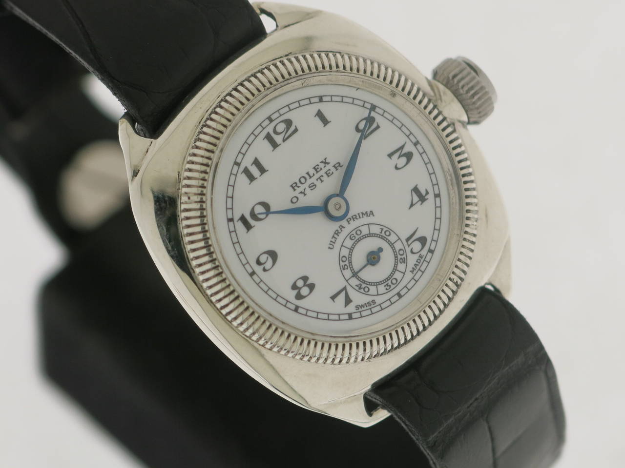 Unusual and very rare silver case Rolex in very good condition with beautiful white enamel dial with black arabic indexes and signed Ultra Prima.

A famous production of the first water resistant case by Rolex.
