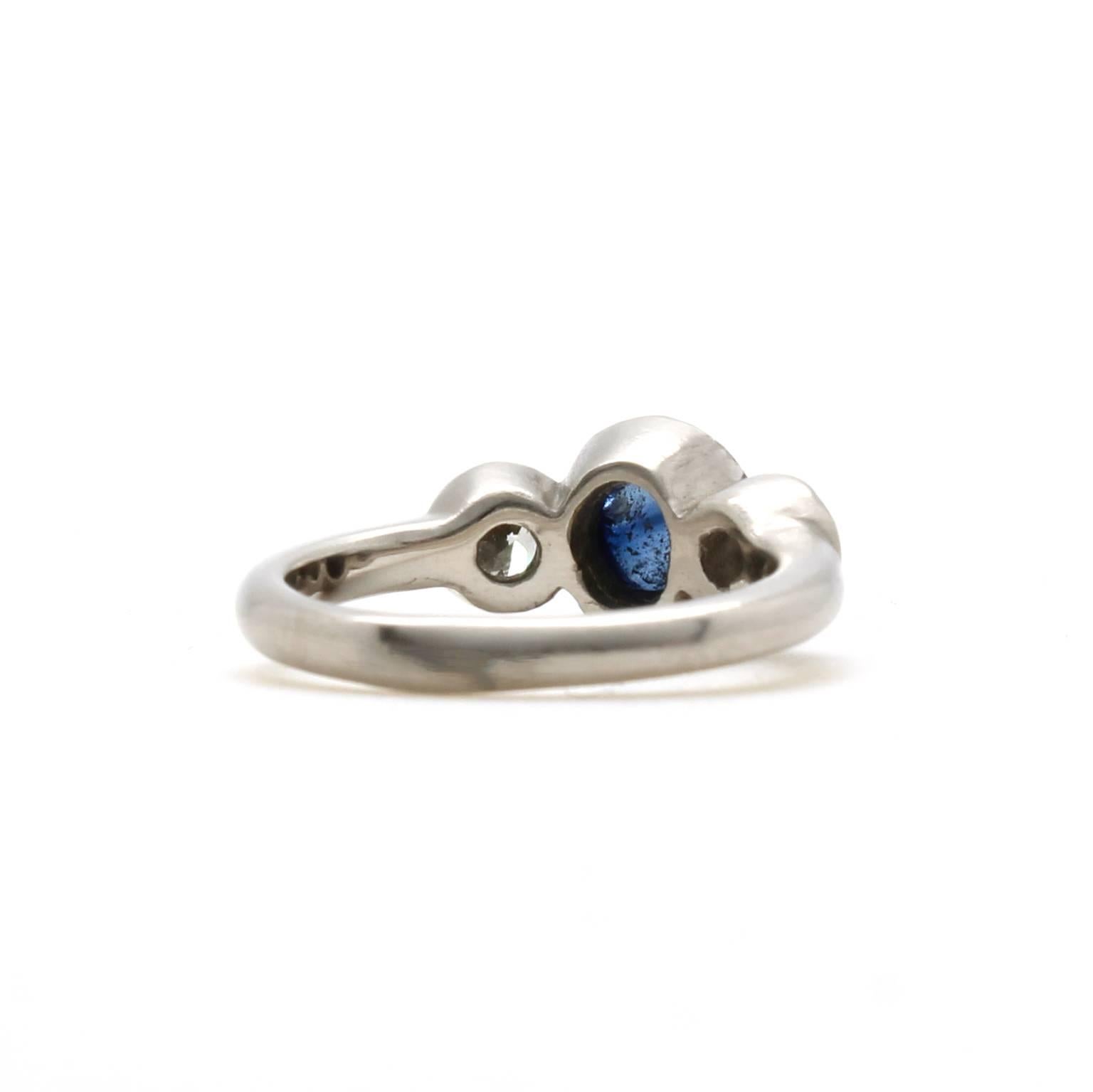 Women's Blue Sapphire Cabochon European Cut Diamond Three Stone White Gold Ring For Sale