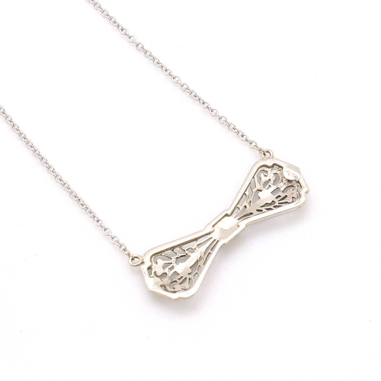 White Gold Art Deco Filigree Bow Pendant In Excellent Condition For Sale In San Francisco, CA