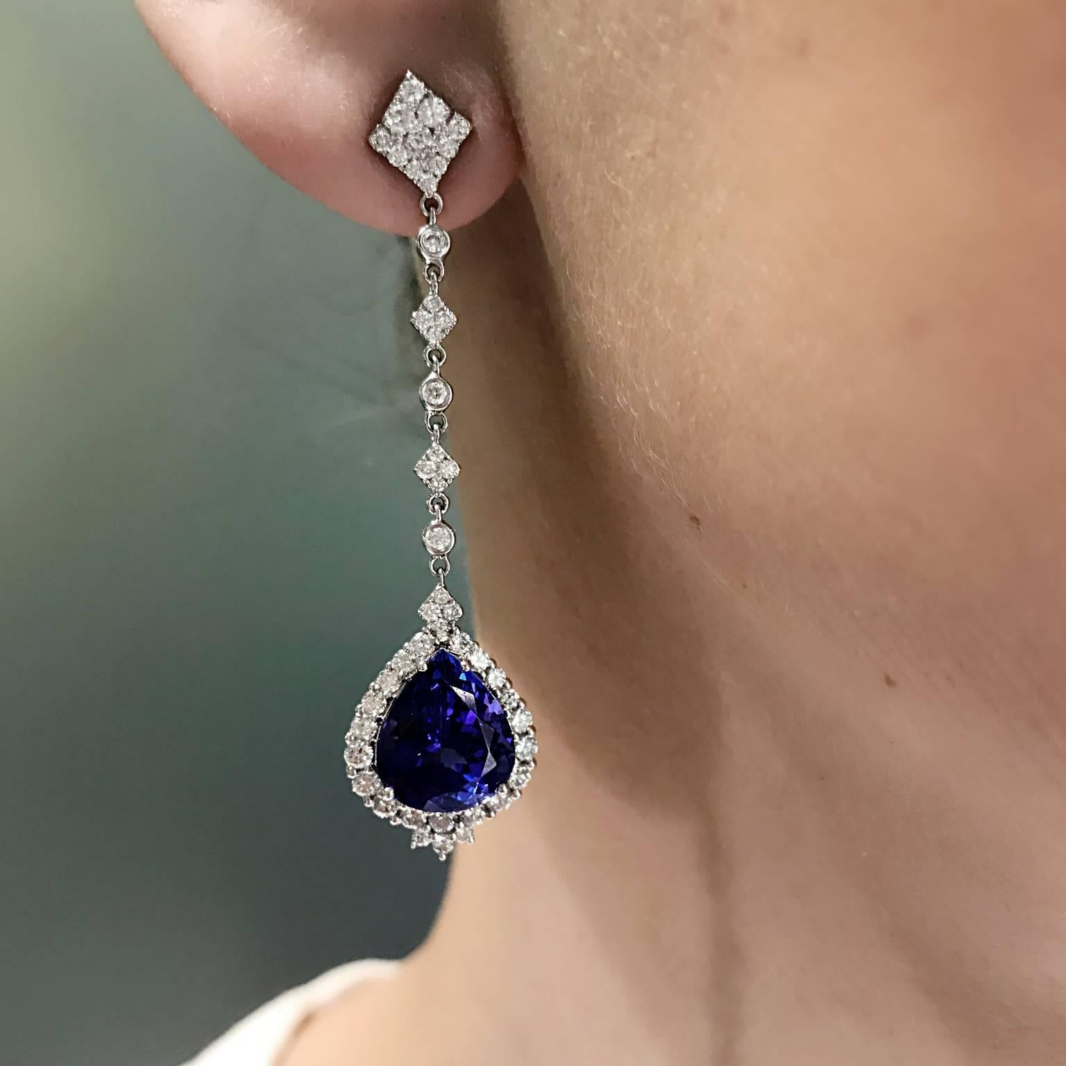 18k White Gold Tanzanite (9X12mm; 11.55cts) and Diamond (1.80cts) Drop Earrings.  Post / Clutch Back

55mm in Length
14mm in Width