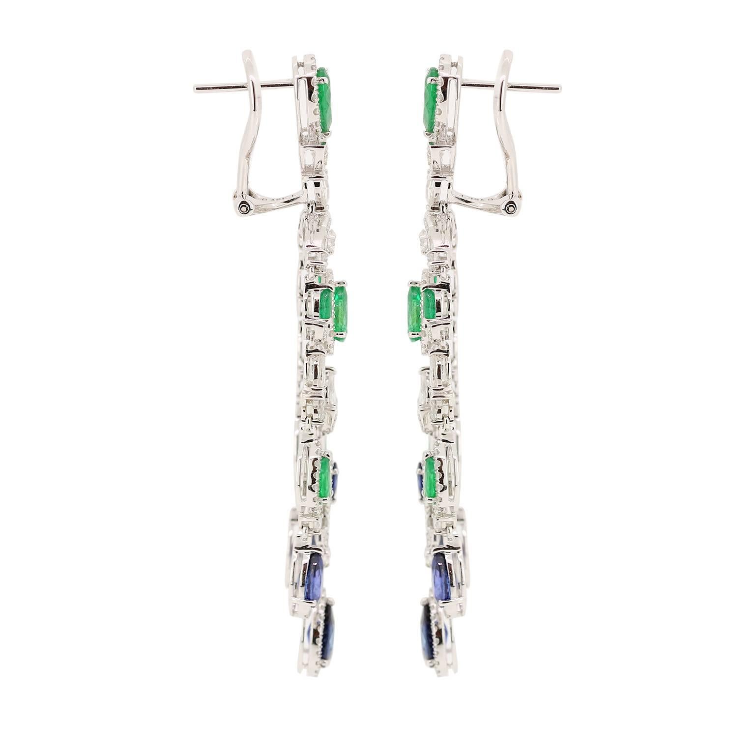 Exotic Blue Sapphire, Emerald and Diamond chandelier earring is the perfect accessory to a black tie affair.  You will be the bell of the ball with these earrings on. Dazzel the night away!

Blue Sapphire approx. - 4.15 carats
Emerald approx. - 2.85