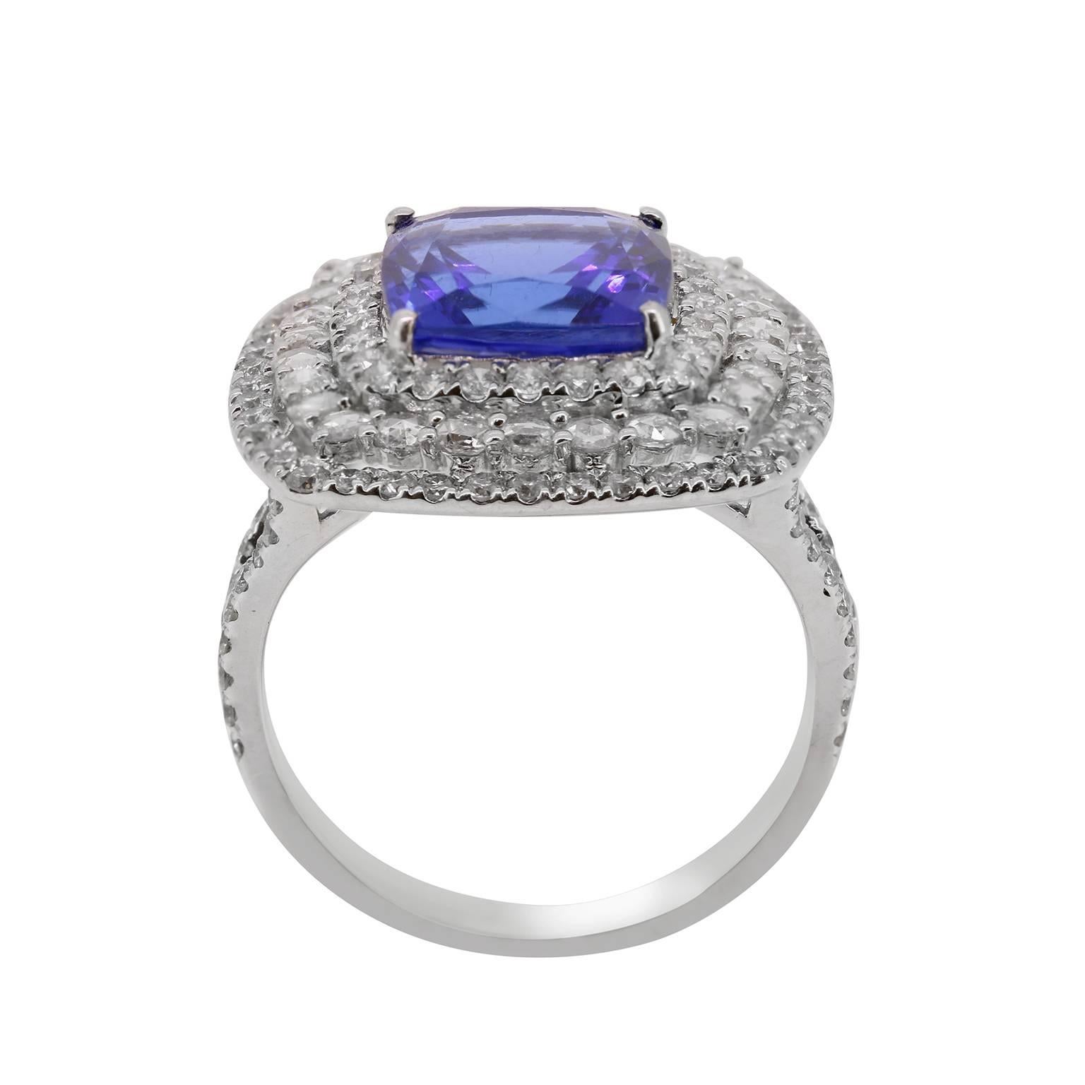 This magnificent 5.15 carat Tanzanite ring is surrounded by 1.78 carats of full cut and rose cut diamonds. This regal ring will be the bell of the ball! 

Size 7, please contact us if sizing is necessary.
20mm X 20mm
