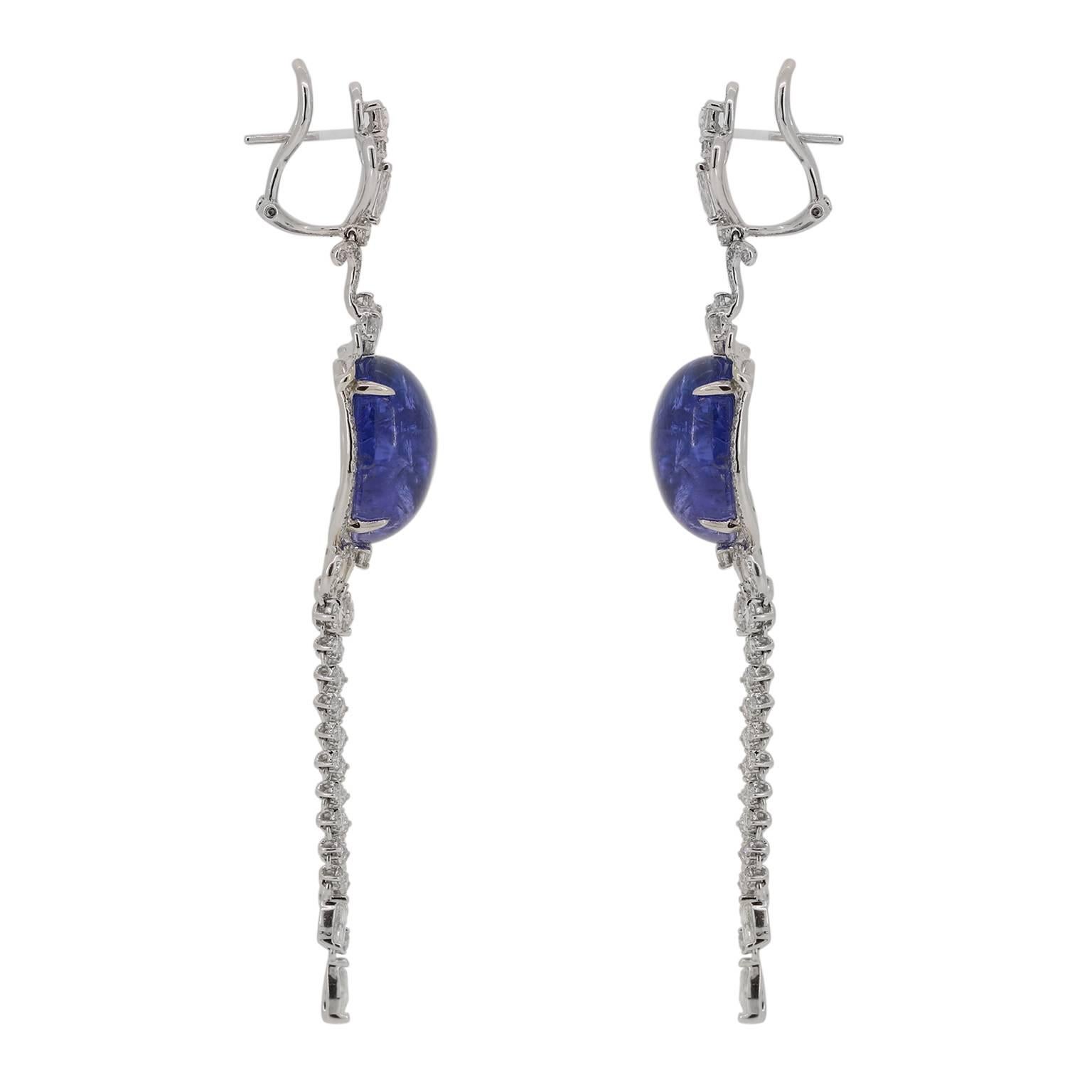 This velvety blue Tanzanite cabochon and diamond earring will look like you have just pulled it out of heirloom jewelry box. Bold yet elegant, this combination of gems is sure to enchant even the most fickle fashionista. 18k White Gold Omega Clip /