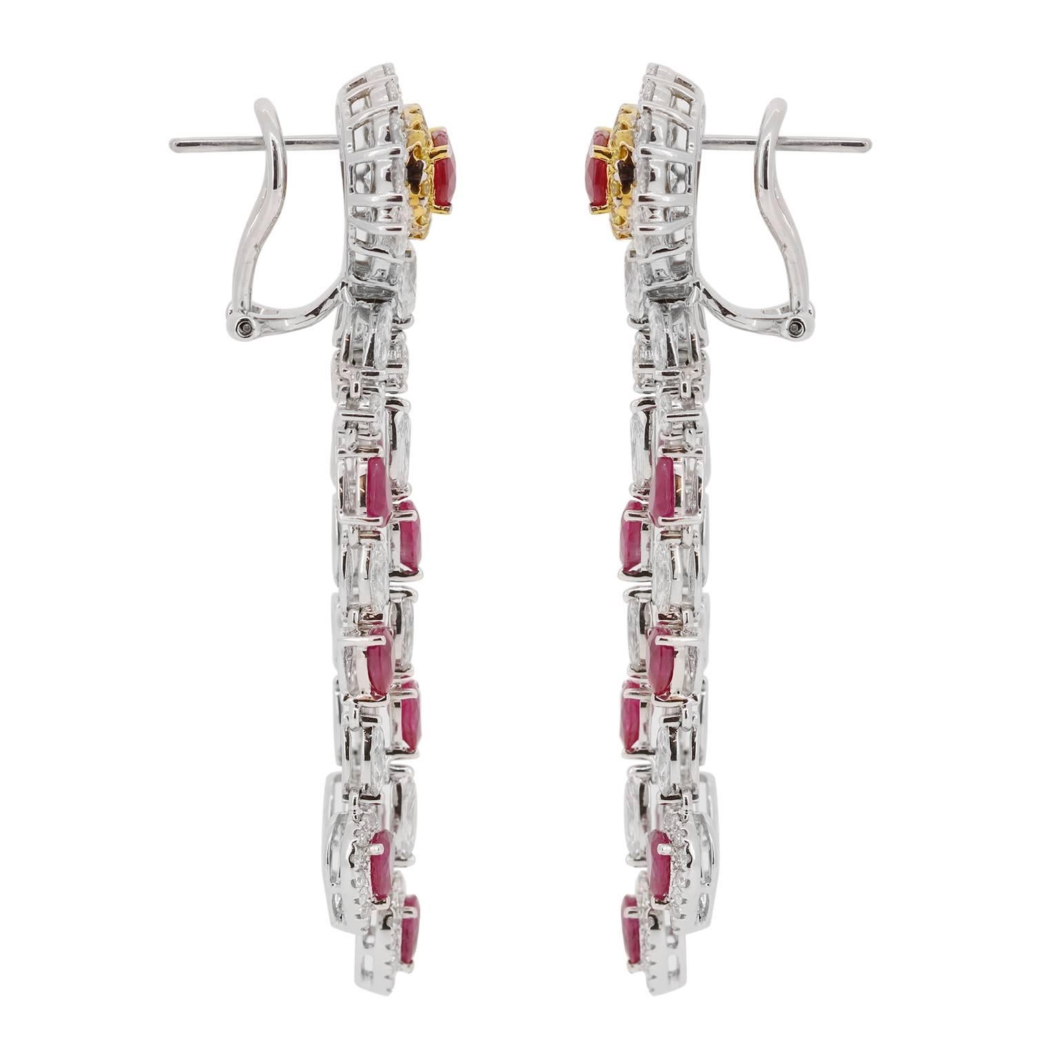 These elegant chandelier earrings will be your go to for a black tie affair.  With 0.53 carats of yellow diamonds and 5.10 carats of white diamonds with a total of 6.5 carats of ruby stations,  You will fall deeply in love with this earring!  Omega