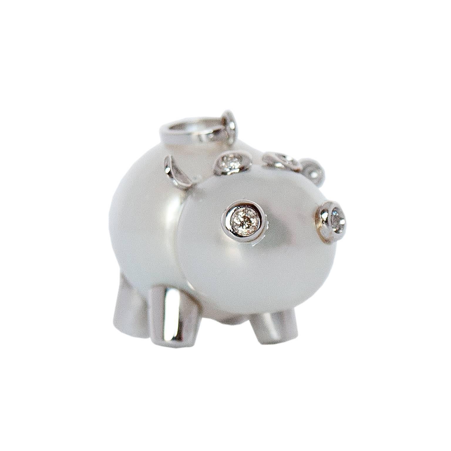 I created this unique piece inspired by my love of all animals and in particular the  hippopotamus. I choose the highest quality materials, white gold with an Australian pearl pendant the shape is unique and very difficult to source and find. The