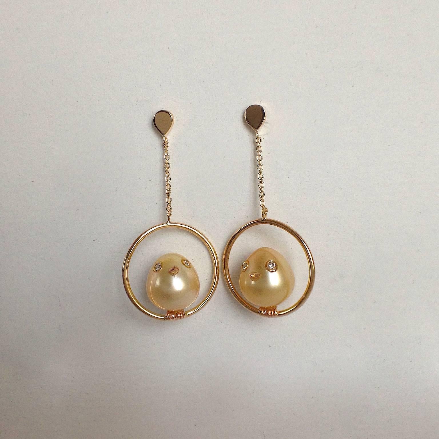 Bird Diamond South Sea Oval Pearl 18Kt Gold Drop Dangle Earrings Made in Italy
On these earring there are two gold Australian pearls. 
I put two white diamonds for its eyes, a red gold beak in each pearl  that with its tiny claws they are like two