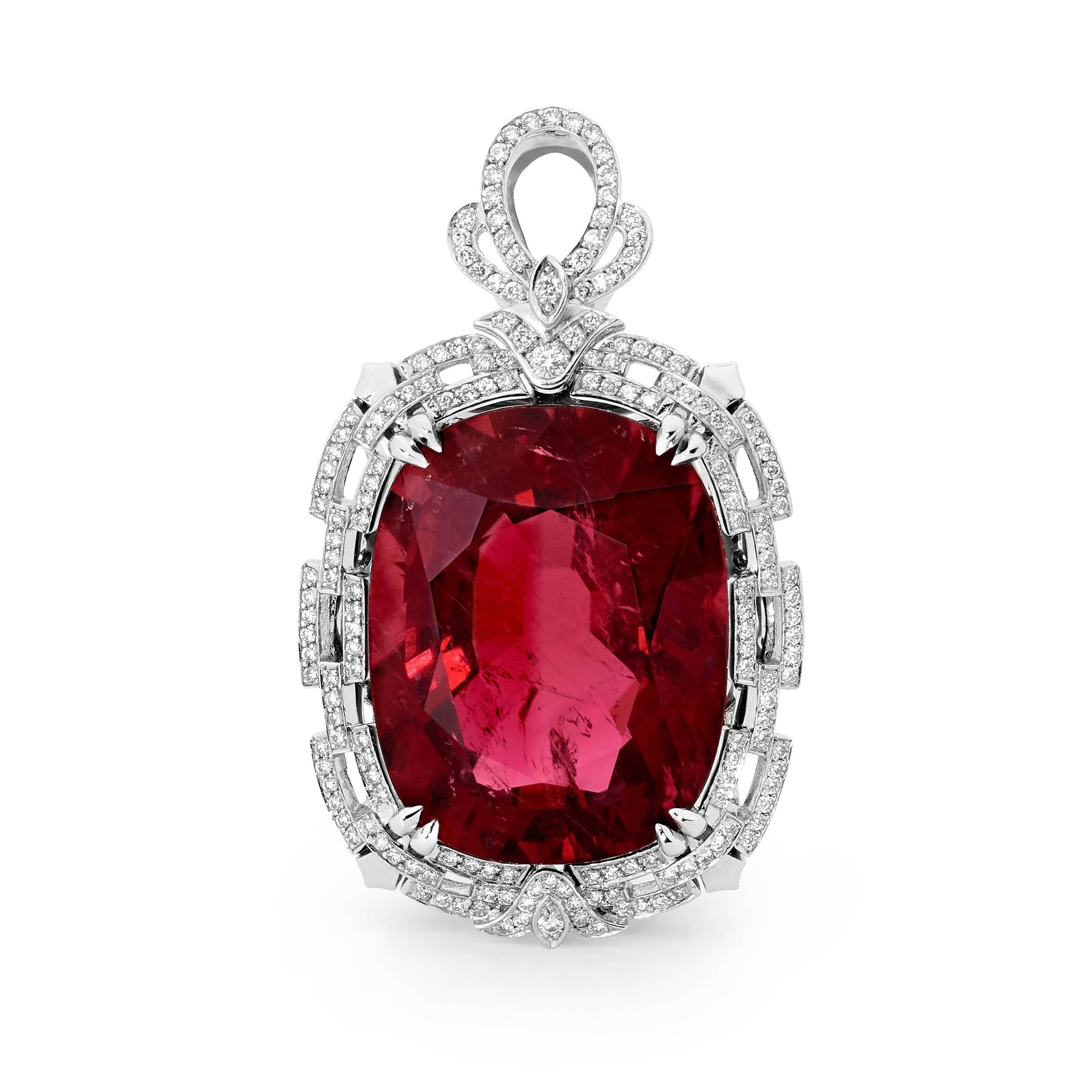 Our Joyau Rouge features a stunning 64.53ct Rubellite Tourmaline at its heart, surrounded with over 1.64cts of bright white diamonds with a VS/SI clarity in an 18ct white gold Art Deco inspired setting. The pendant is suspended on a three layer