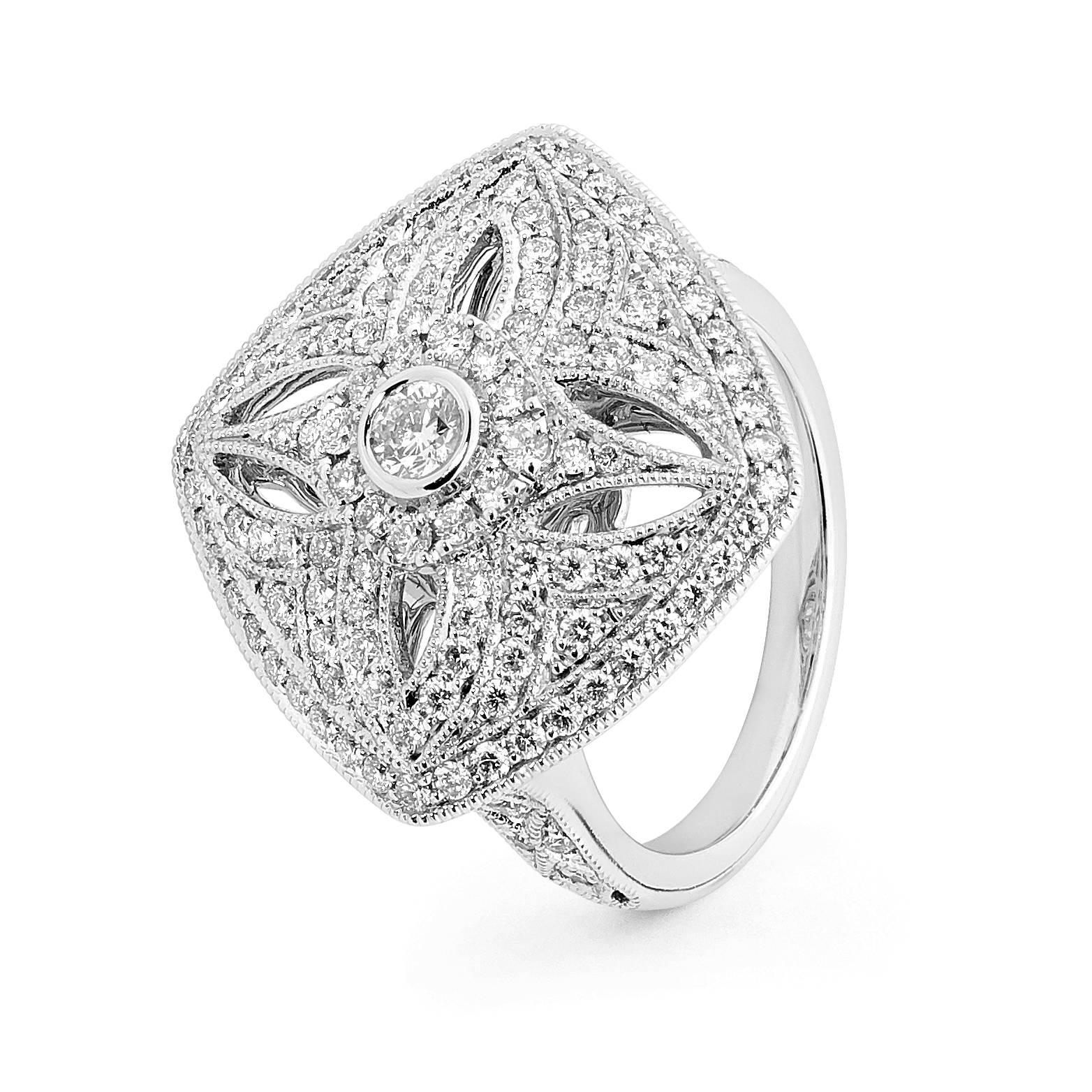 18 carat white gold cocktail ring beautifully crafted in a one-of-a-kind Art-Deco inspired design featuring 123 diamonds weighing 1.25cts (color G / SI). 
Resizing available free of charge (depending on possibility). 