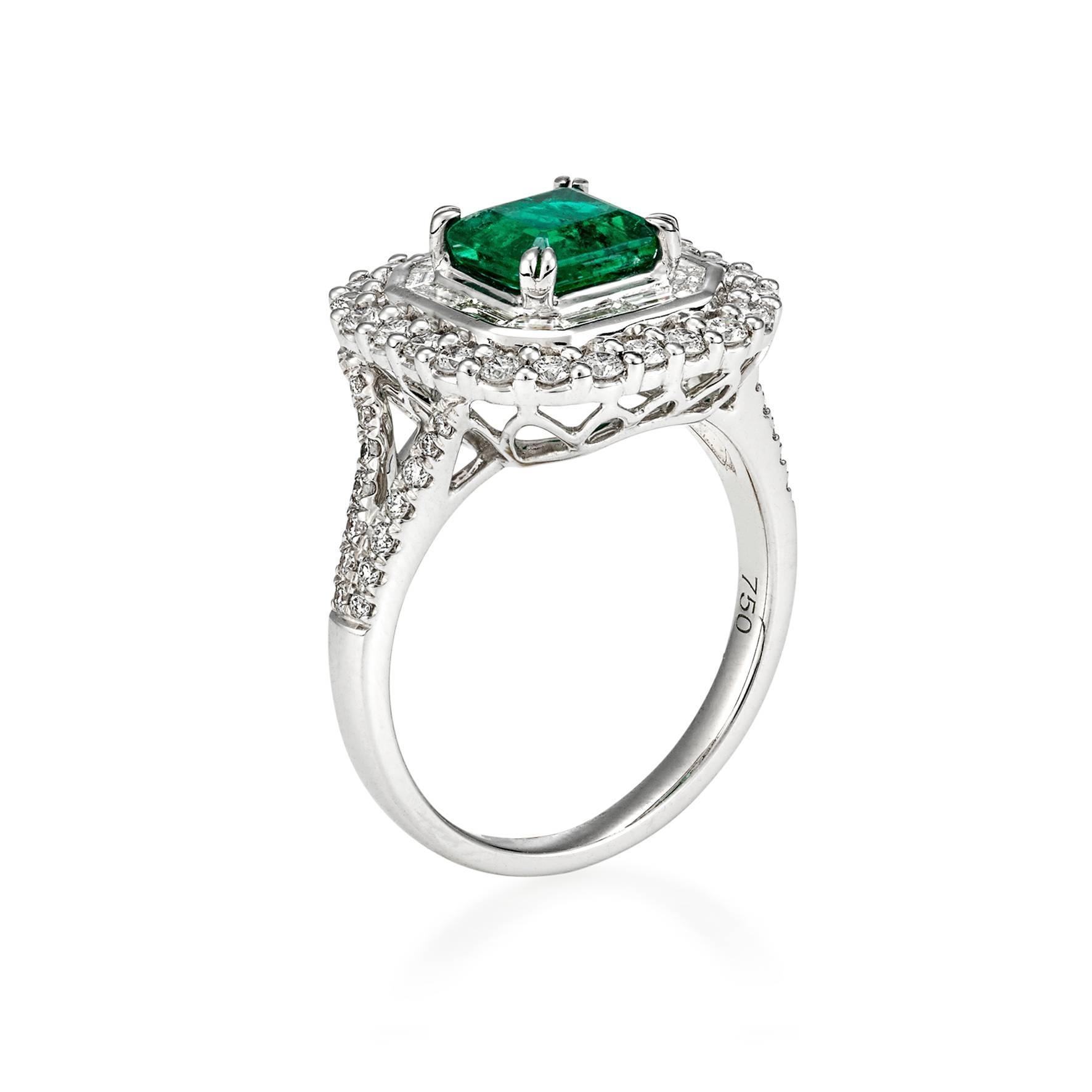 This spectacular Cocktail Ring features a 2.40ct Emerald Cut Emerald, surrounded with divine fine White Baguette Diamonds (totalling 0.746ct) set in 18ct White Gold.

Resizing available free of charge (depending on possibility).