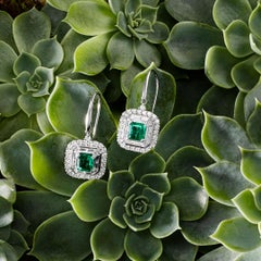 18 Carat White Gold 1.3 Carat Emerald and 1.314 Carat Diamond Art Deco Earrings