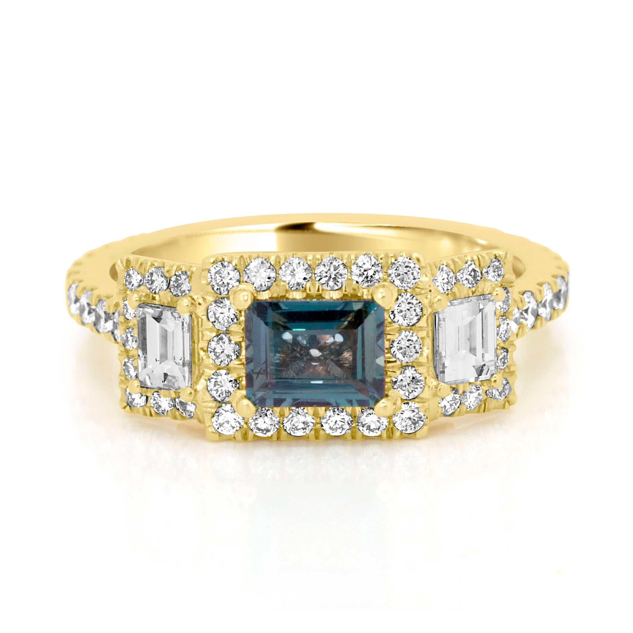 0.66 Carat Rectangular Alexandrite Good Color Change Encircled in a Halo of White round Diamond 0.70 Carat Flanked by 2 Baguettes on side in 18K Yellow Gold Ring. MADE IN USA.  