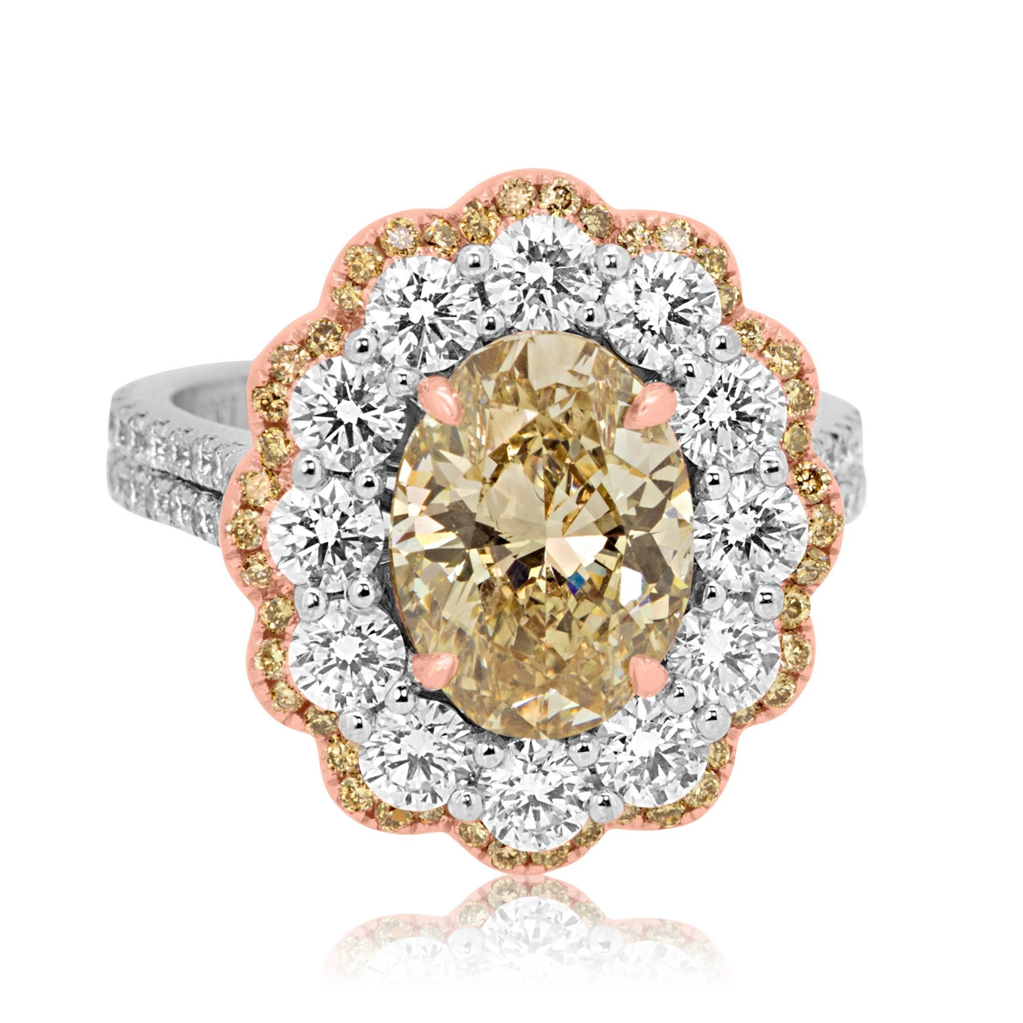 EGL USA Certified 3.14 Carat Champagne Oval Diamond 3.14 Carat encircled in Double Halo of White Diamond 2.33 Carat and Champagne diamond 0.54 Carat in 18K White and Rose Gold Ring. 