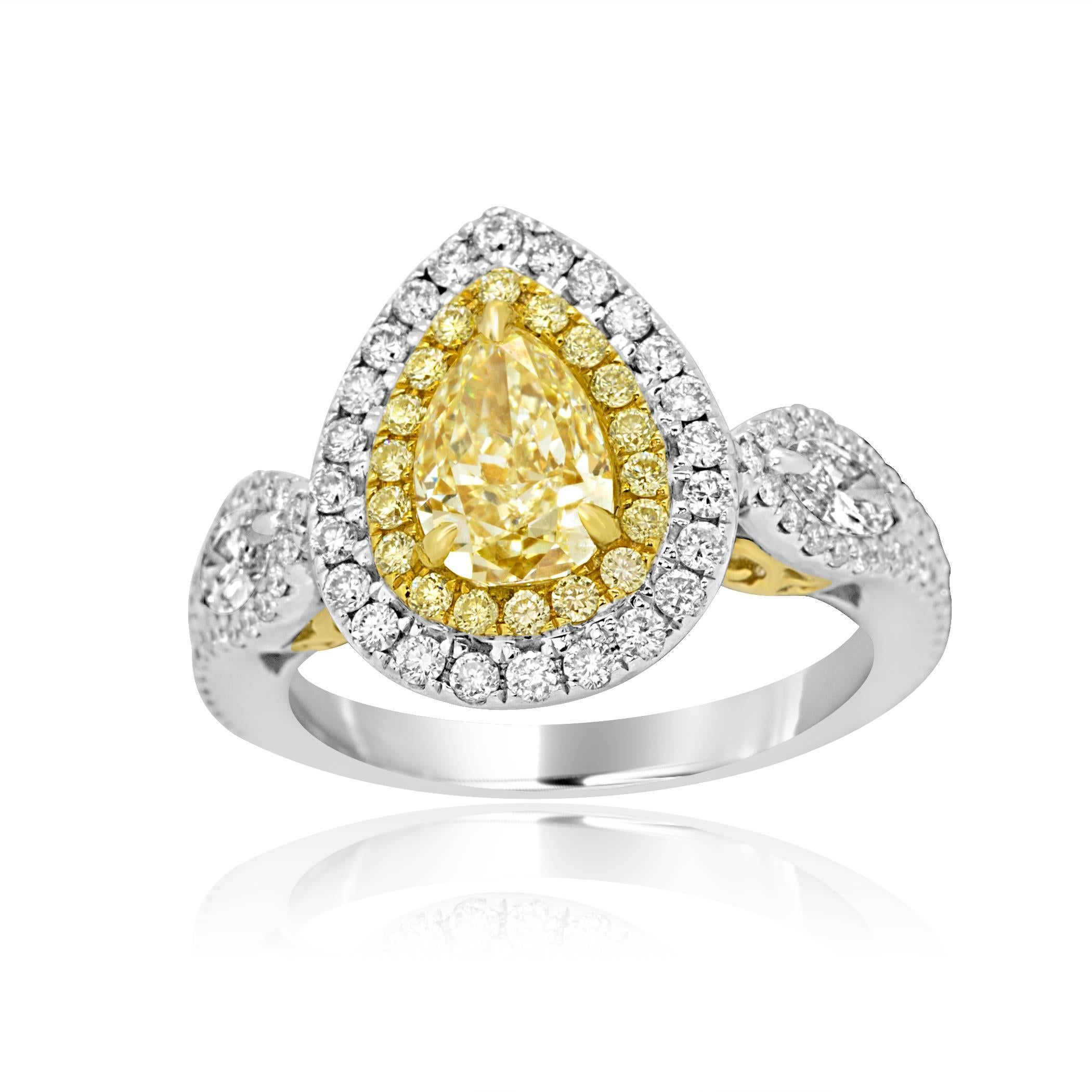 EGL USA certified Fancy Yellow VS1 1.29 Carat encircled in Double Halo of Natural Fancy yellow Diamonds 0.31 Carat and white Diamonds 0.63 Carat flanked by 2 white Diamond Marquis 0.31 Carat  in 18K White and Yellow Gold,