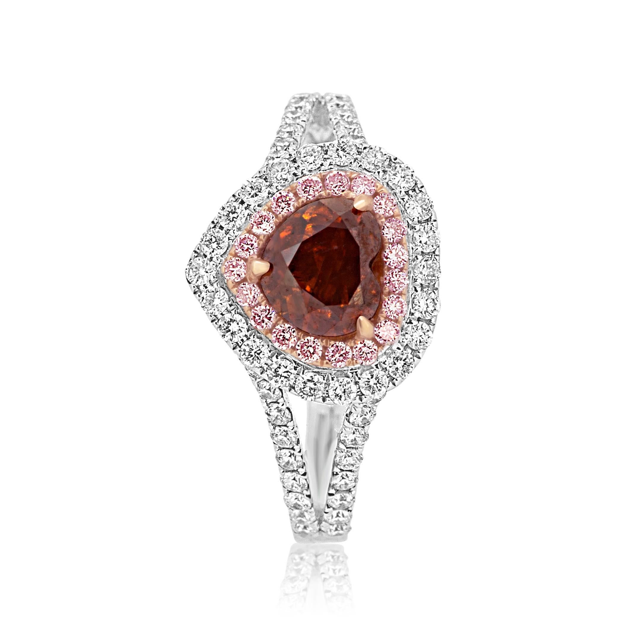 A very rare EGL USA Certified Fancy Dark Brown Orange Heart Shape Diamond 1.02 Carat encircled in a double halo of Natural Fancy pink Diamond Rounds 0.22 Carat and White Diamond Rounds 0.54 Carat in 18K White and Rose Gold Split Shank Bridal Fashion