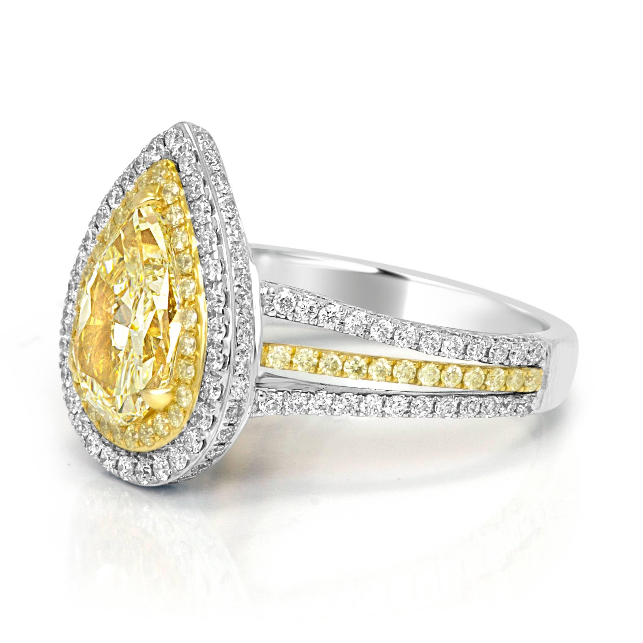EGL USA Certified Pear shape Natural Fancy Light Yellow Diamond VS1 Clarity 2.49 Carat encircled in a Halo of Natural Fancy Yellow Diamonds Round Brilliant SI Clarity 0.44 Carat and White G-H Color VS-SI Clarity Round Brilliant Diamonds 1.07 carat