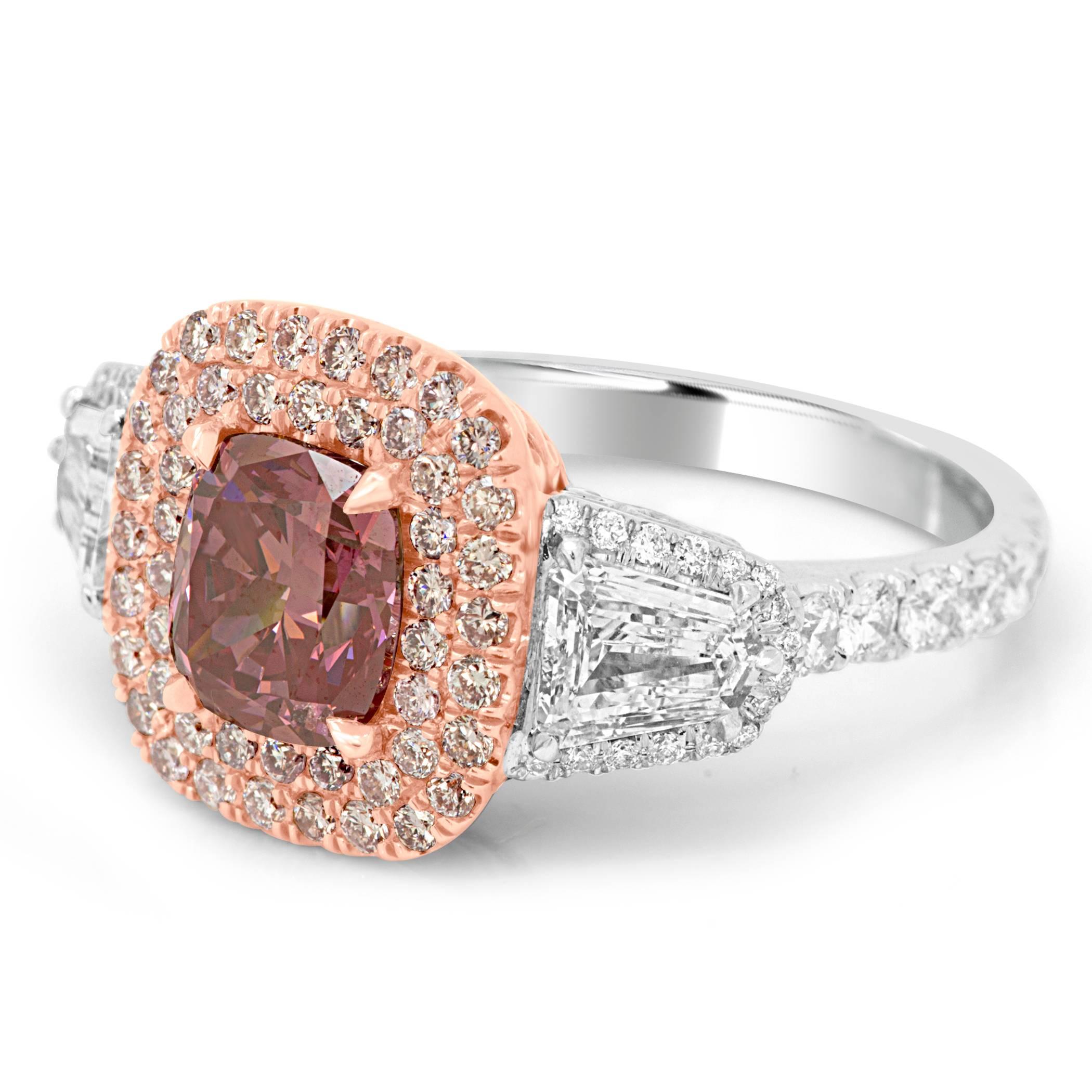 For The Collector, Extremely Rare One of a kind GIA Certified HPHT Fancy Vivid Purplish Pink VVS1 clarity Diamond 1.49 carat encircled in a double halo of natural pink diamond round 0.40 carat flanked by 2 White G-H Color VS-SI Clarity Diamond
