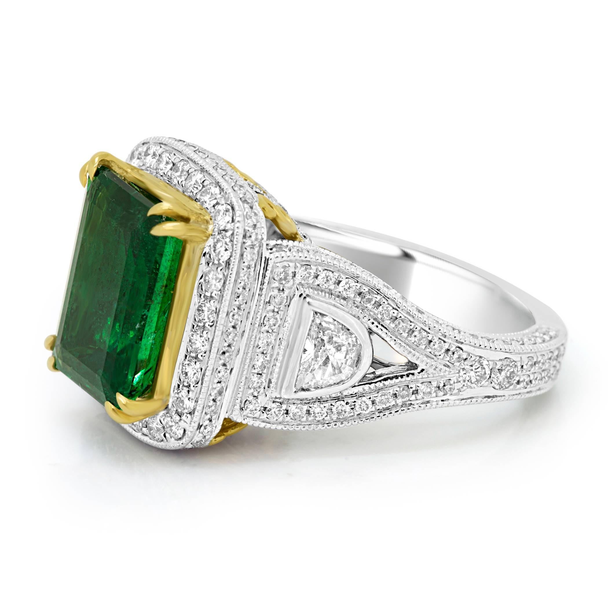 GIA Certified Gem quality Zambian Emerald cut  Emerald 4.38 carat encircled in a halo white round diamond 1.48 carat and Half Moon diamond 0.44 carat in 18k White and Yellow gold in Handmade intricate Bridal Fashion Cocktail Ring.

Style available