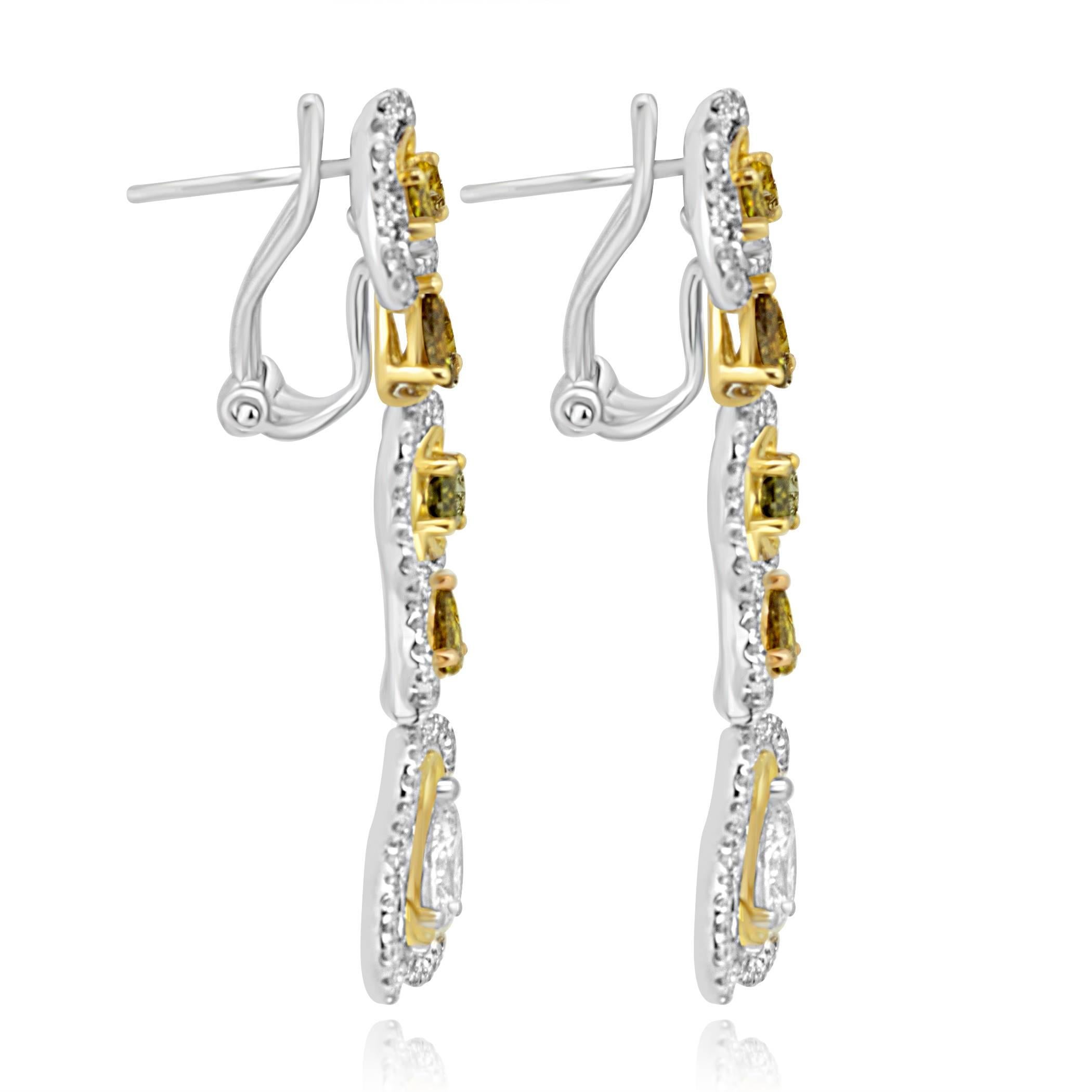 2 White Diamond Pear Shape 0.77 Carat 8 Natural Multi color Diamond Ovals and Pear shape 1.66 Carat with White Diamond Rounds 1.01 Carat around them in One of a Kind 18K White and Yellow Gold Dangling Earring.

Total Diamond Weight 3.44 Carat