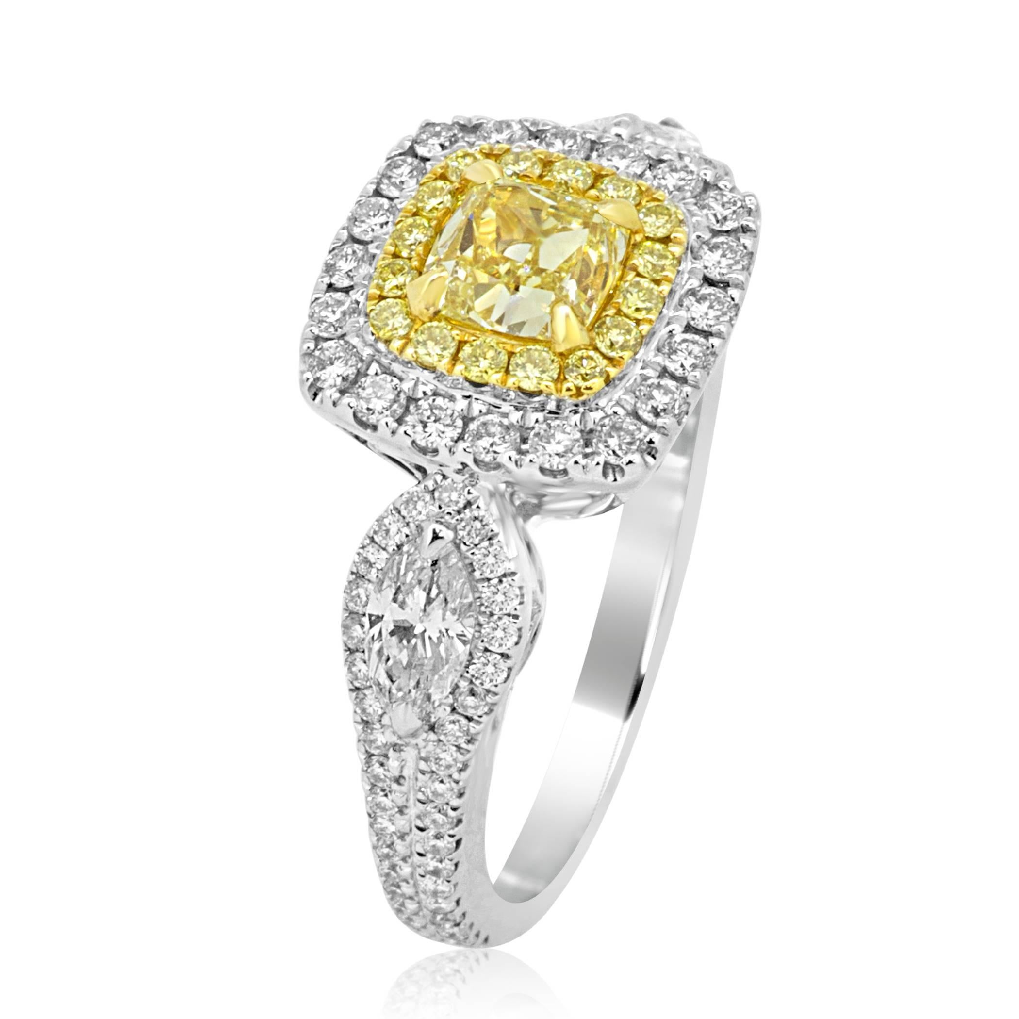 EGL USA Certified Fancy Intense Yellow VS1 Clarity Cushion 0.74 Carat encircled in a Double Halo of natural fancy yellow diamond round 0.16 Carat and white diamond round 0.57 Carat flanked by two diamond marquis 0.42 Carat in 18K White and Yellow