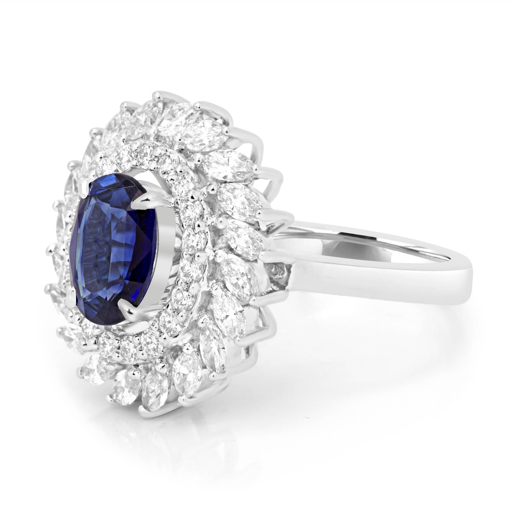 GIA Certified Stunning Blue Sapphire 1.50 Carat Encircled in a Halo of White Diamond Rounds VS Quality and White Diamond Marquise VS Quality  1.10 Carat in 14K White Gold Stylish Fashion Cocktail Ring.

Style available in different price ranges.
