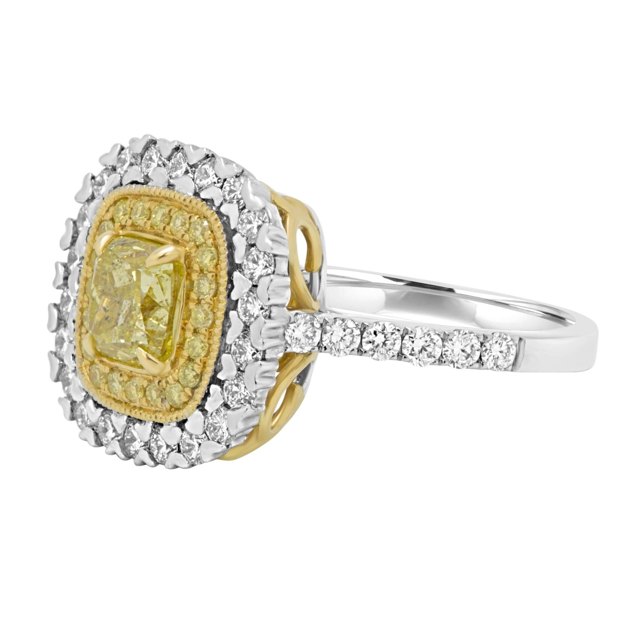 Natural Fancy Yellow Diamond Cushion 0.72 Carat encircled in a double Halo of Natural Fancy Yellow Diamond Rounds 0.15 Carat and White Diamond Rounds 0.67 Carat in 18K White and Yellow Gold Bridal and Fashion Ring.

Style available in different