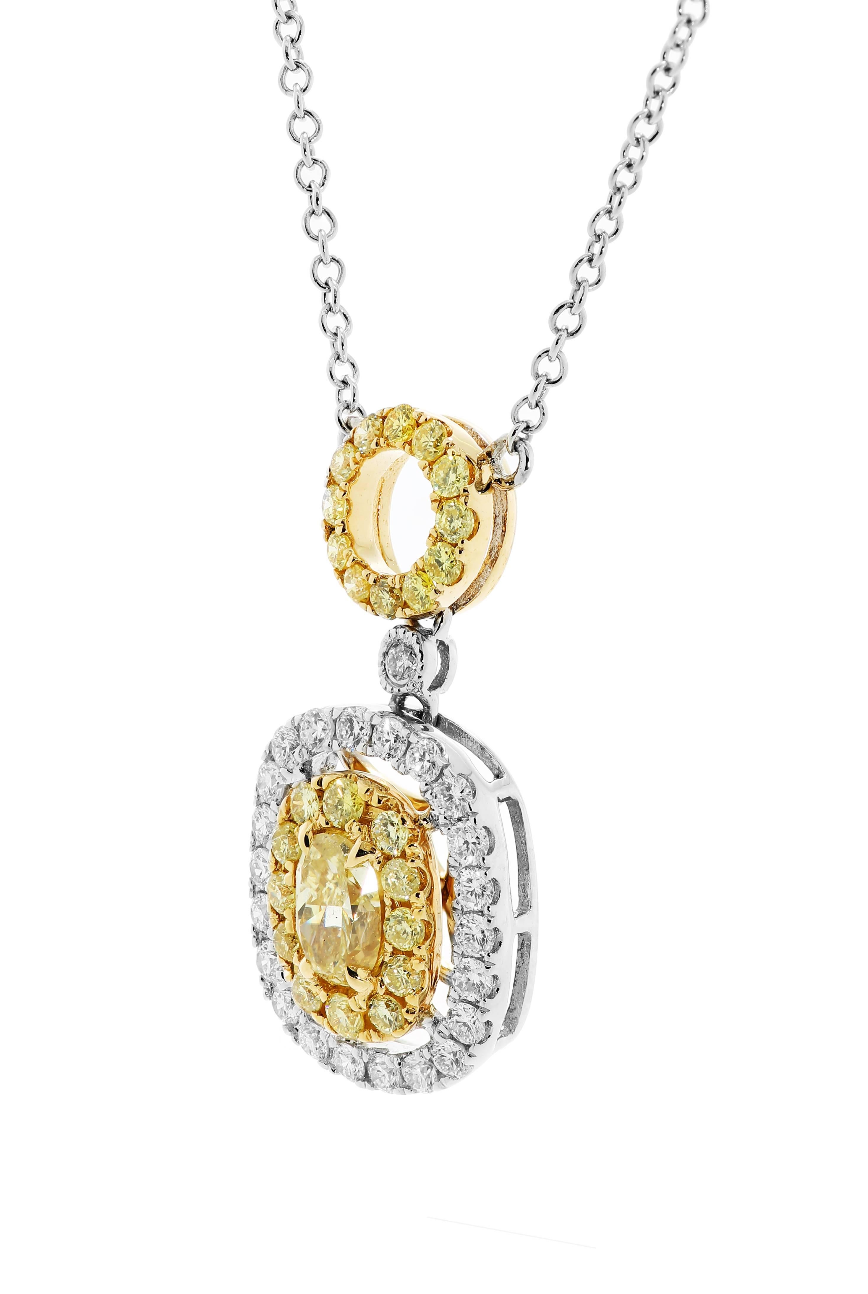 Natural Fancy yellow Diamond Oval 0.46 Carat encircled in a double Halo of Natural fancy yellow diamond rounds 0.45 Carat and white diamond round 0.27 Carat in 18K White and Yellow Gold Necklace with Diamond By Yard Chain.

Style available in