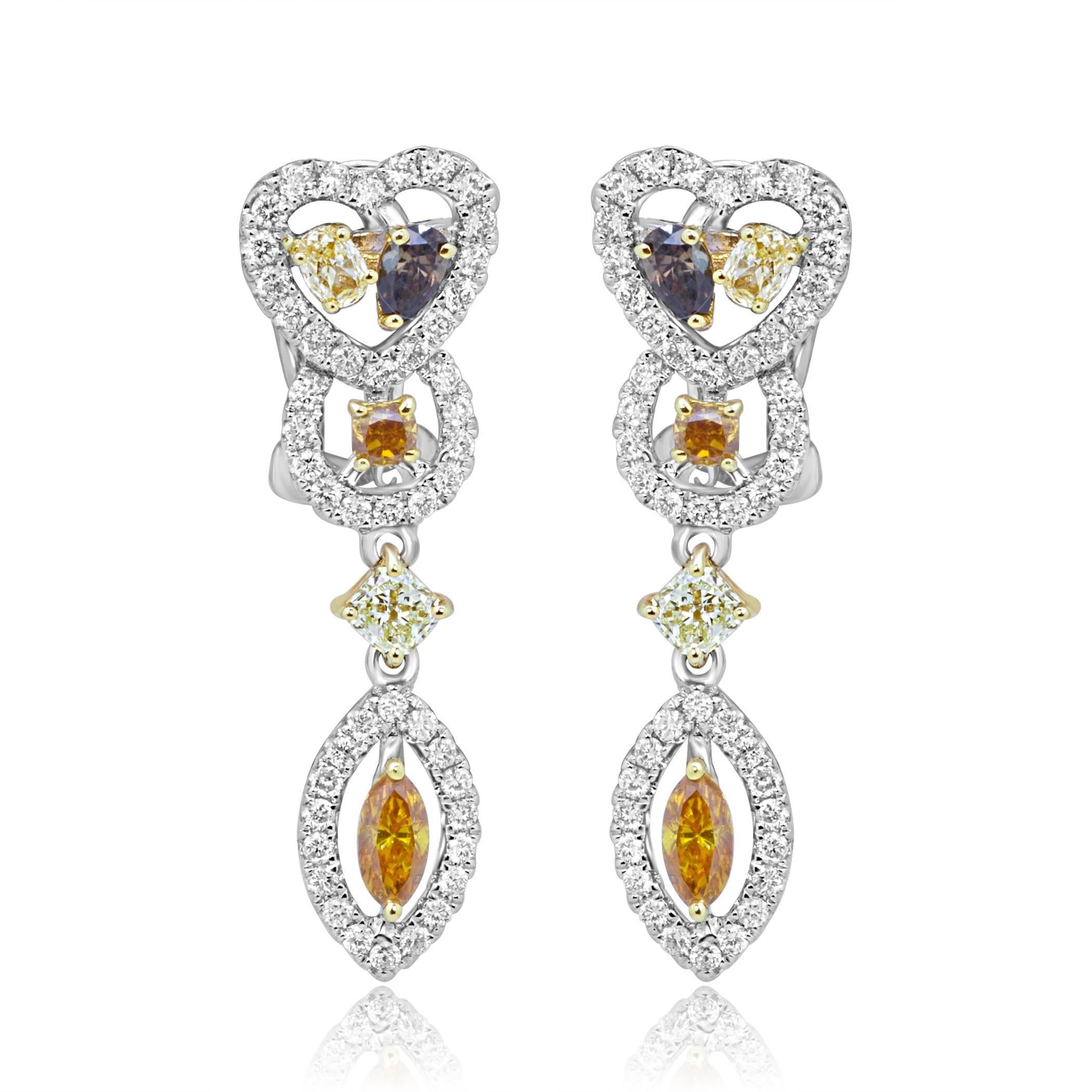 Beautiful 10 Multicolored and Mix Shapes Natural Fancy color Diamonds 1.31 Carat Encircled in a single Halo of White Round Diamonds 0.73 Carat in 18K White and Yellow Gold One of a Kind Earring.

Total Diamond Weight 2.04 Carat