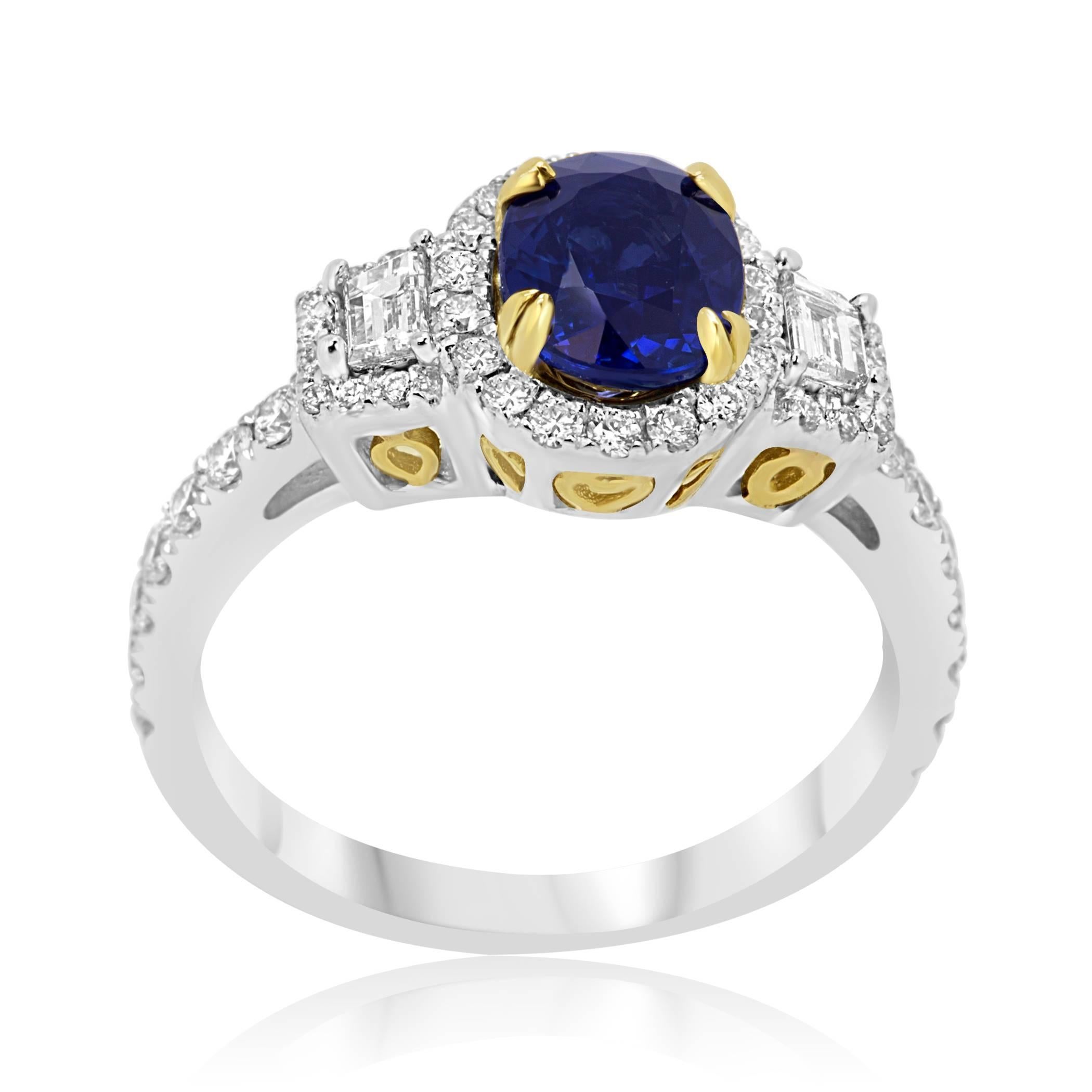  Blue Sapphire Oval 1.64 Carat flanked by 2 White Diamond Trapezoid on the side 0.20 Carat encircled in a single halo of white round diamond 0.53 Carat in stunning 14K White and Yellow Gold Ring.

Total Stone Weight 2.37 Carat.