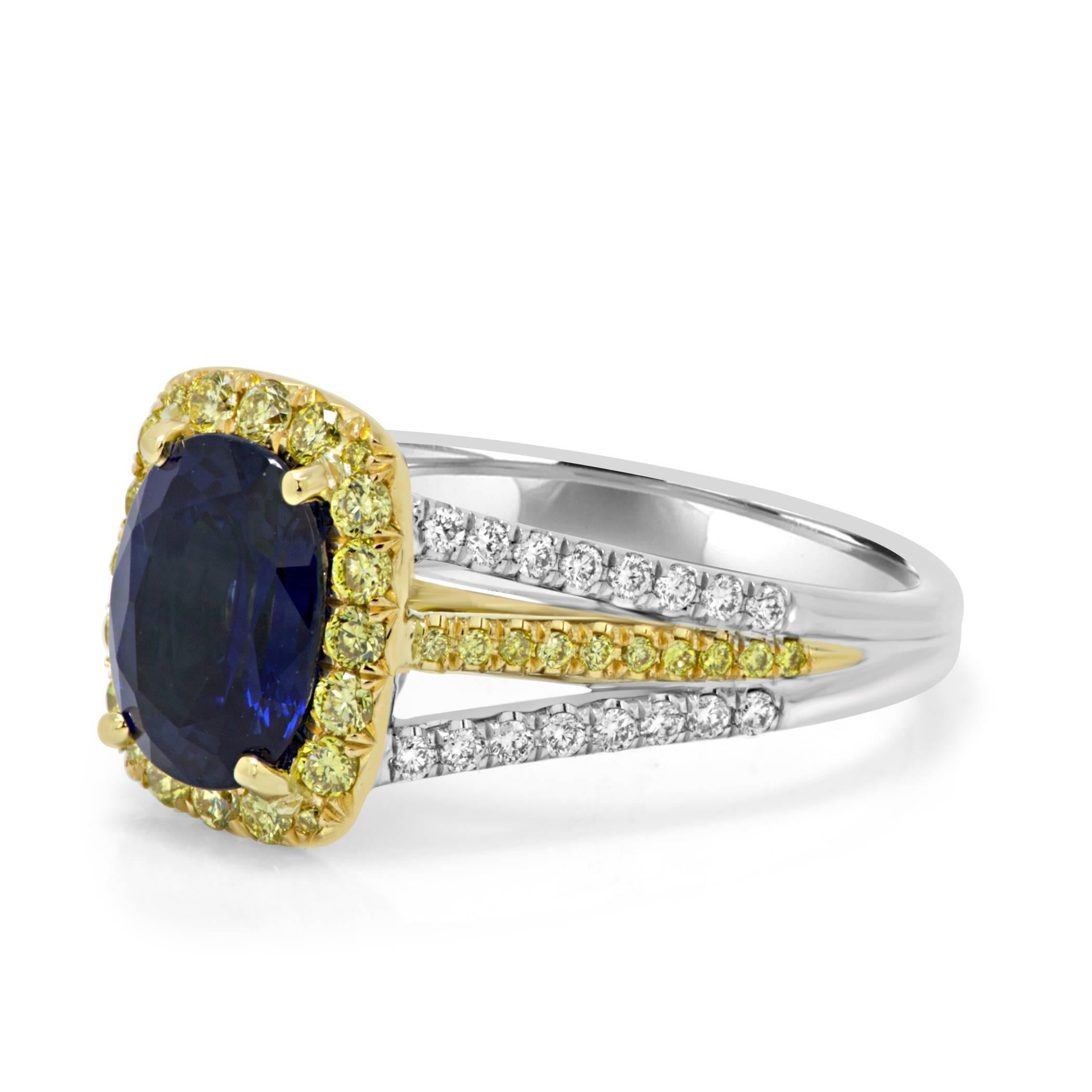 Modern Blue Sapphire Diamond Halo Two-Color Gold Ring